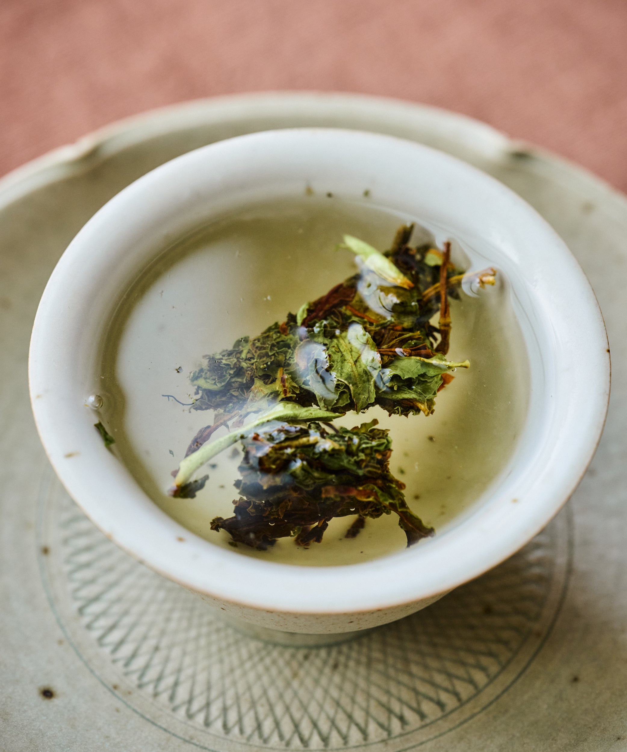 Hot water poured over Ancient Wild White in a gaiwan