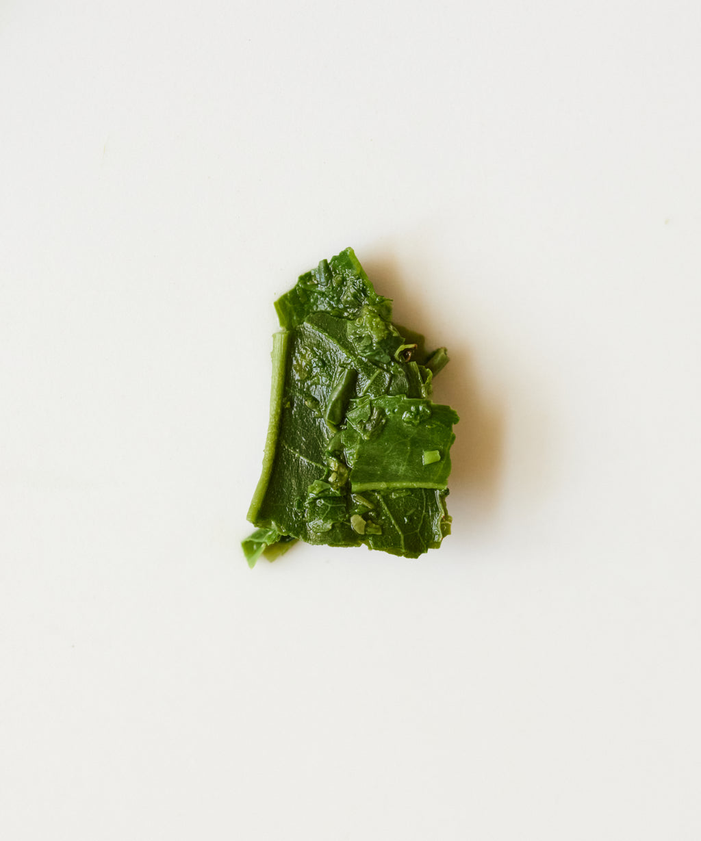 Brewed Shizuoka Gyokuro Mizu no Tsuyu showing luminous green liquor with light suspended mouthfeel