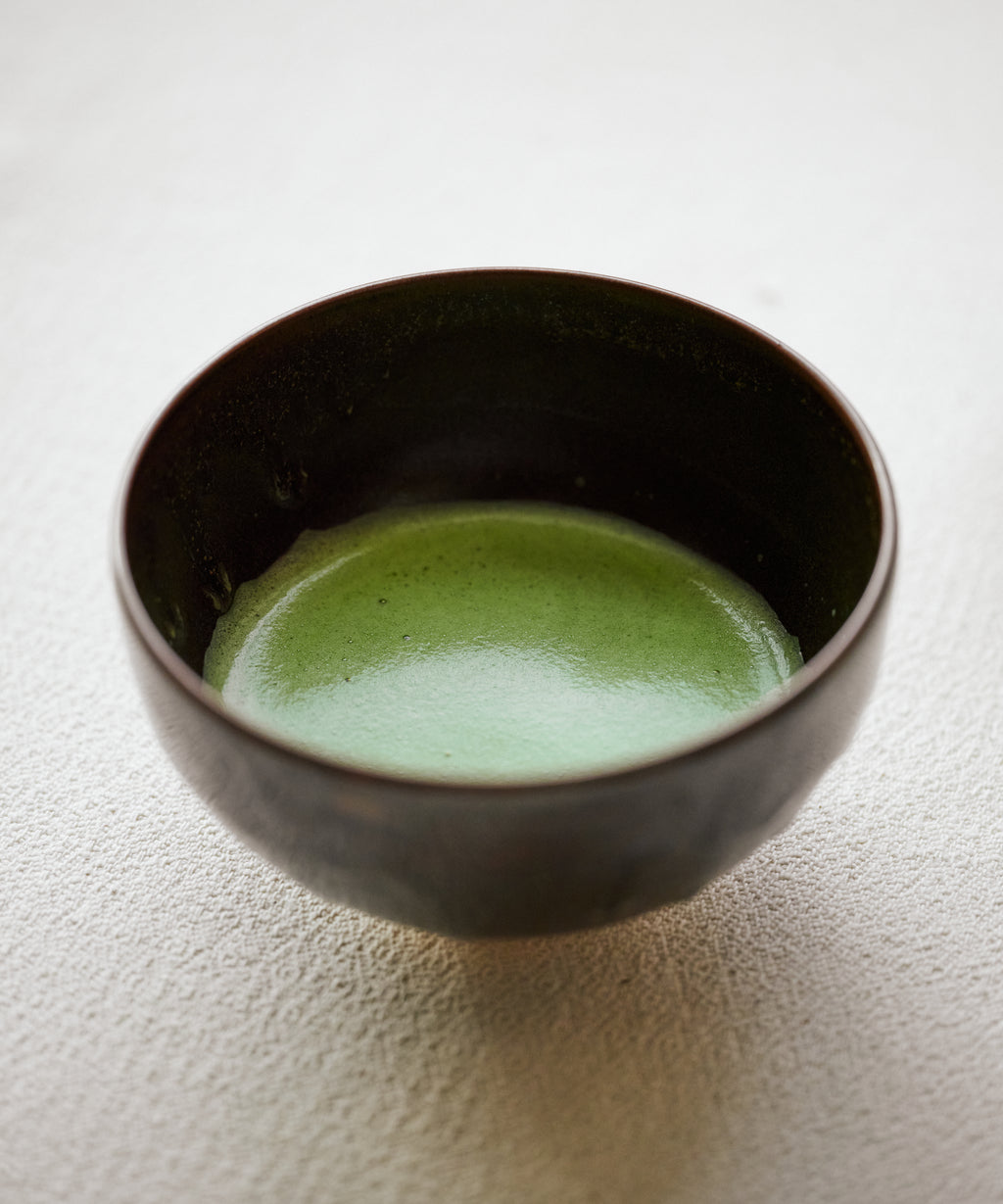 Whisking Matcha Seihyo no Shiro Shincha with bamboo chasen, light creamy texture with powdery mouthfeel