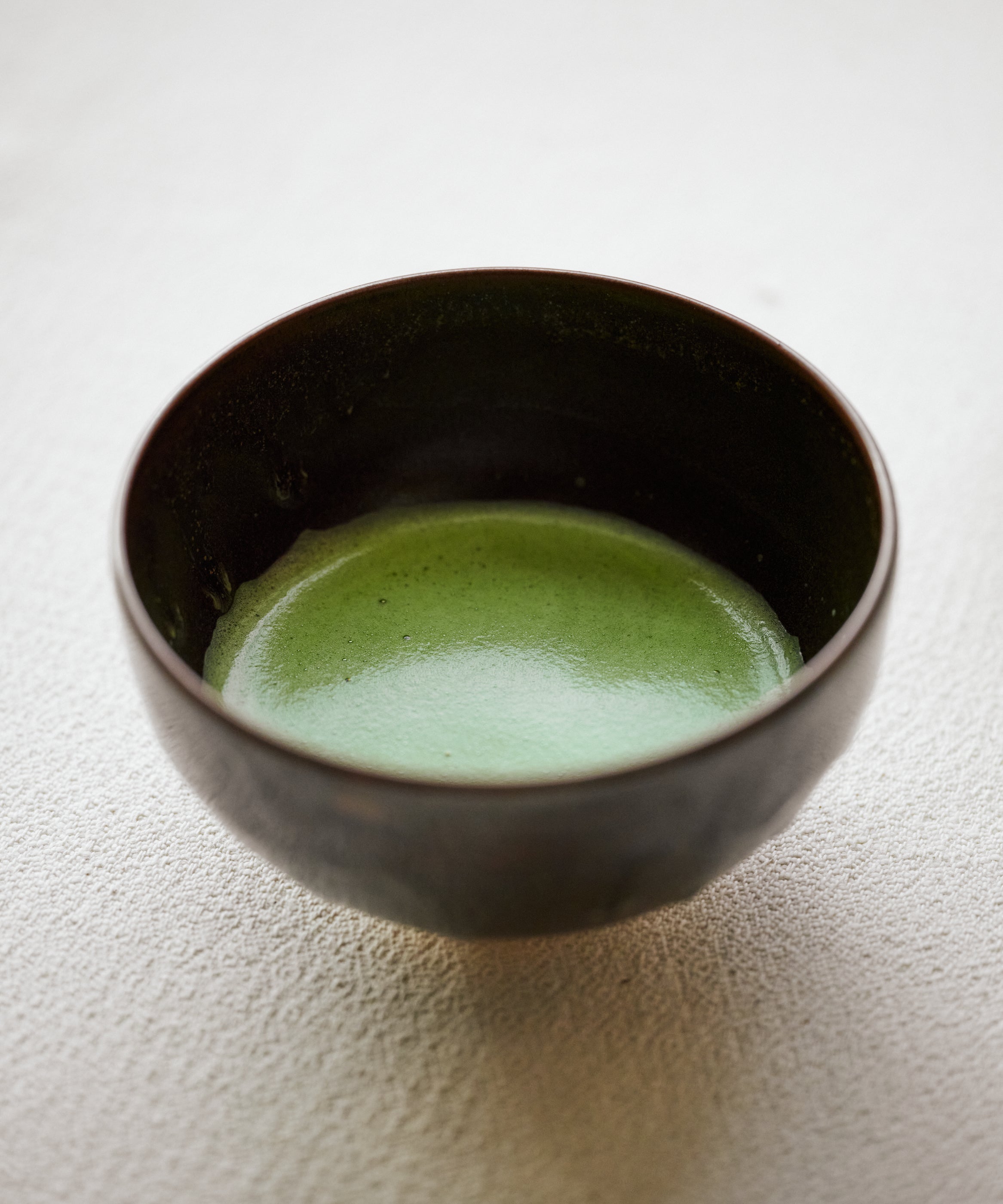 Whisking Matcha Seihyo no Shiro Shincha with bamboo chasen, light creamy texture with powdery mouthfeel