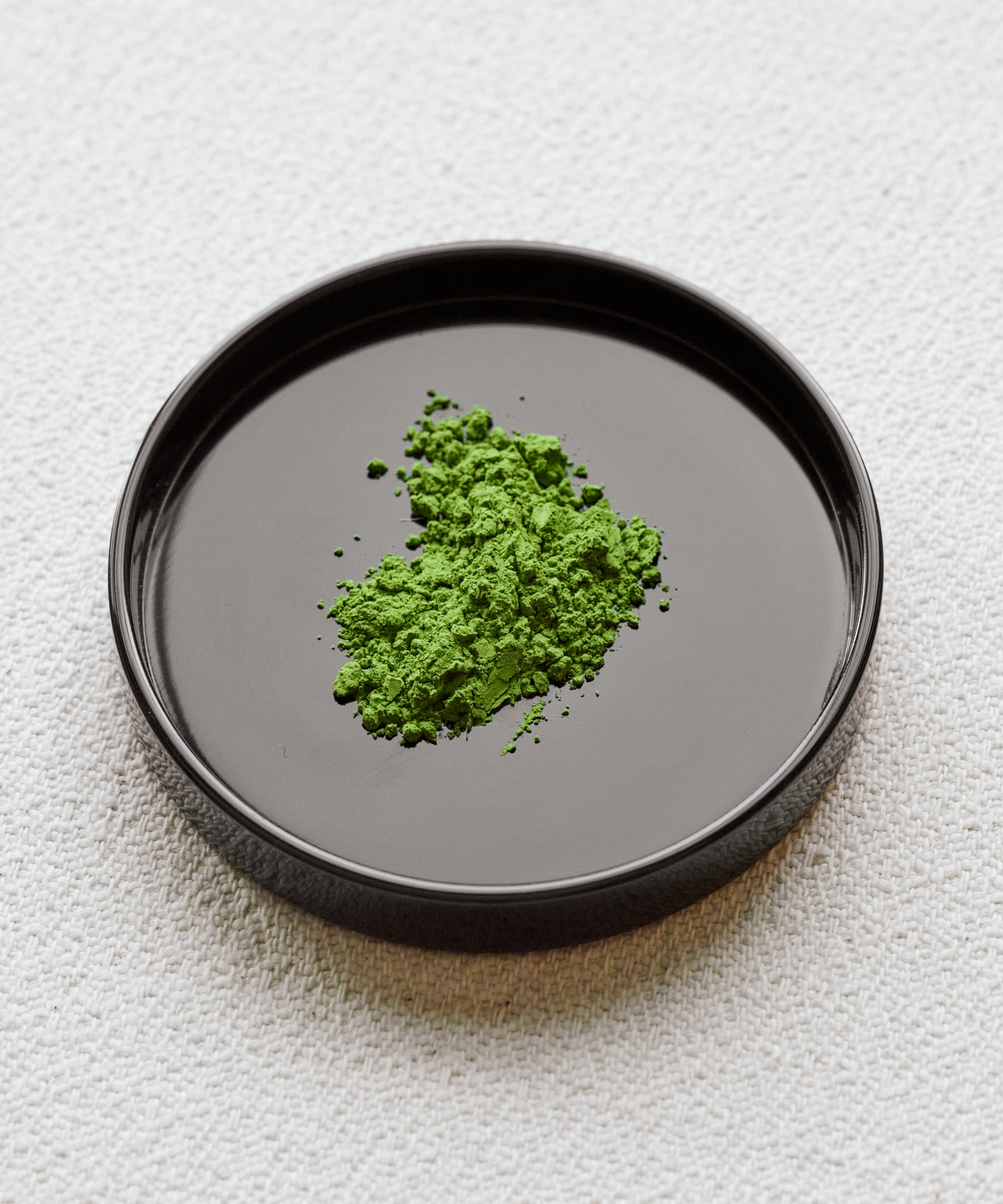 Matcha Kakegawa premium Japanese latte grade matcha powder in black ceramic bowl