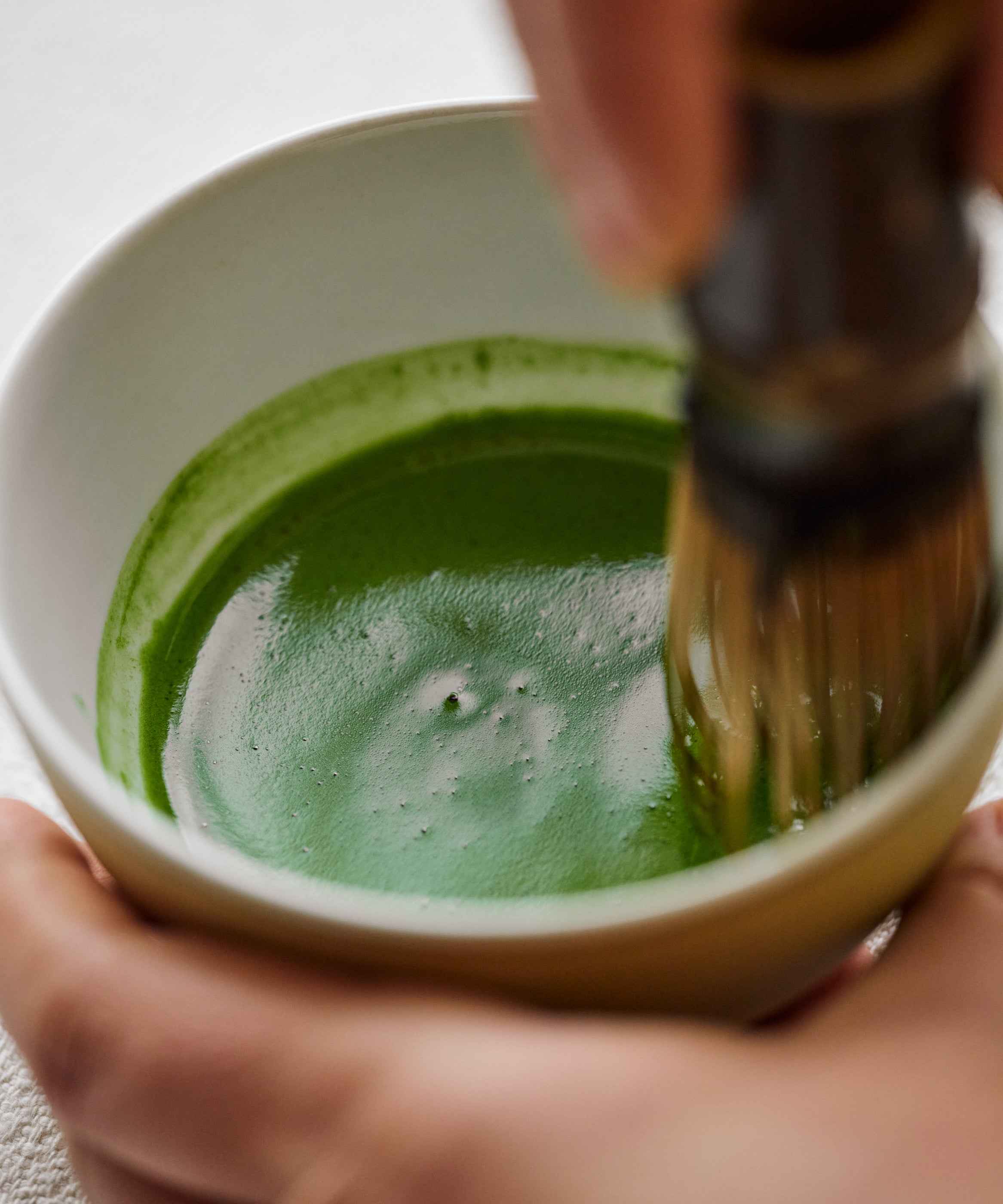 Hand whisking Matcha Kakegawa Japanese matcha with bamboo chasen