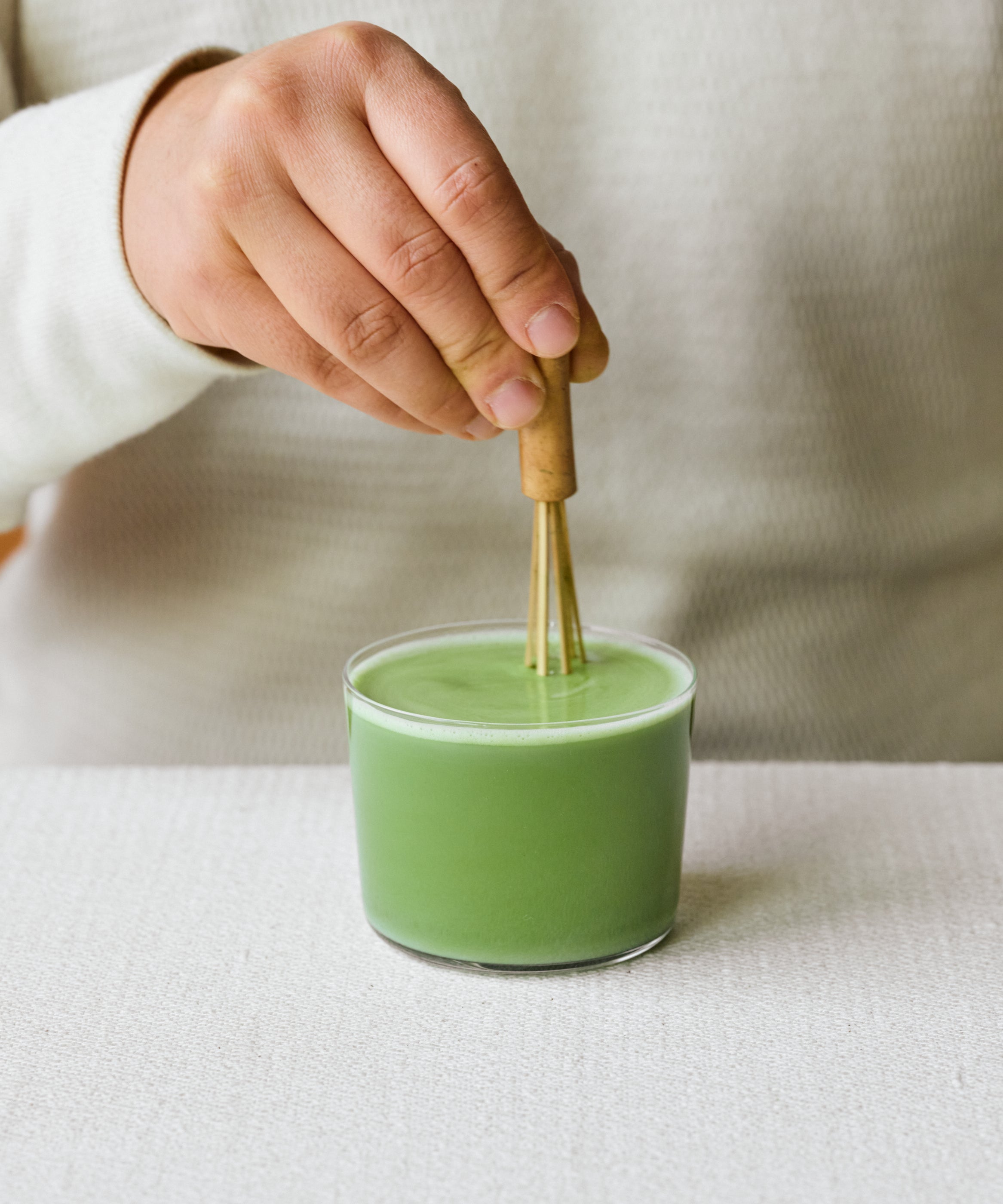 Top-down view of Matcha Kakegawa latte with vibrant pastel green color