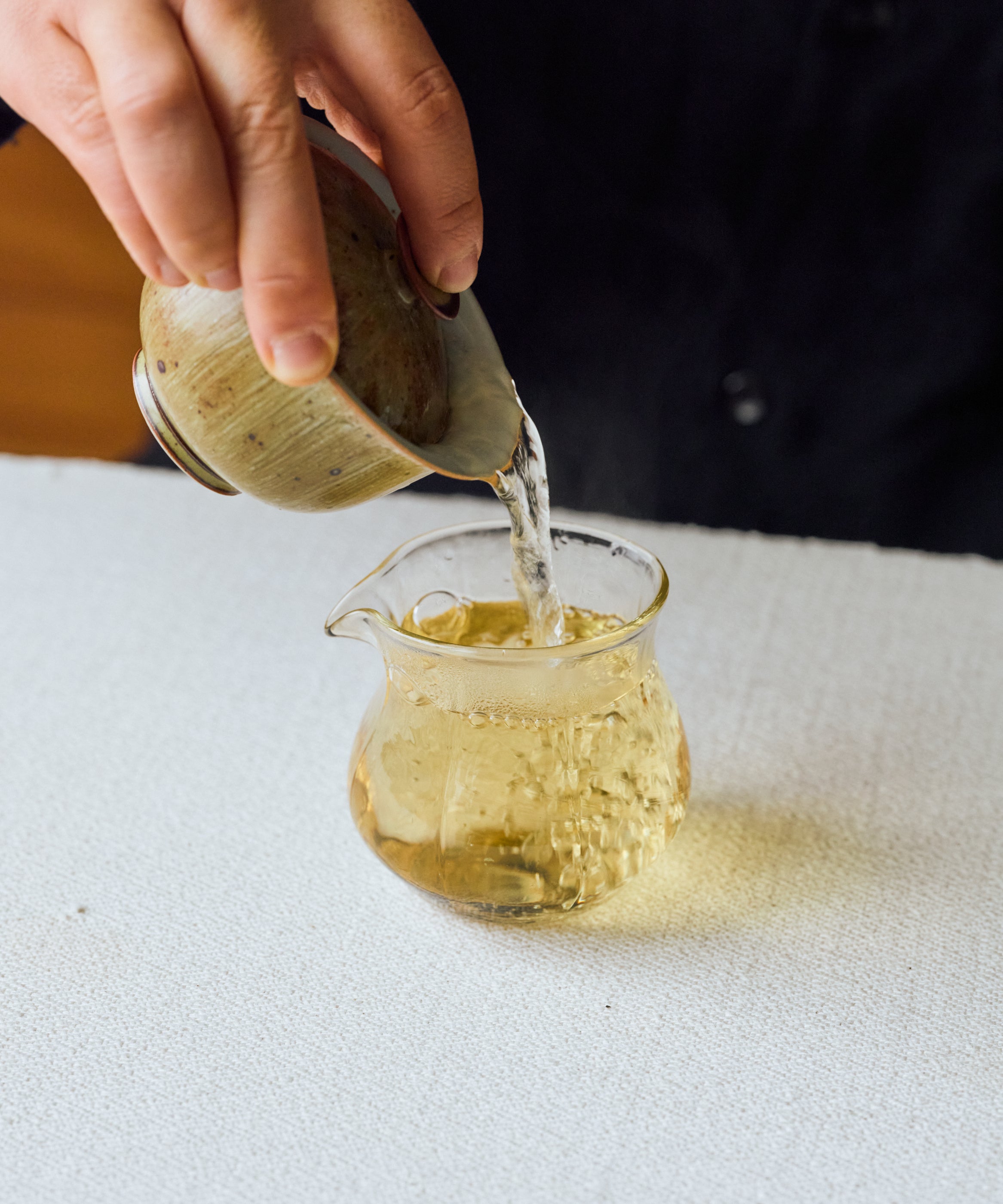 Hot water poured over Huangtang Yellow Broth in a gaiwan