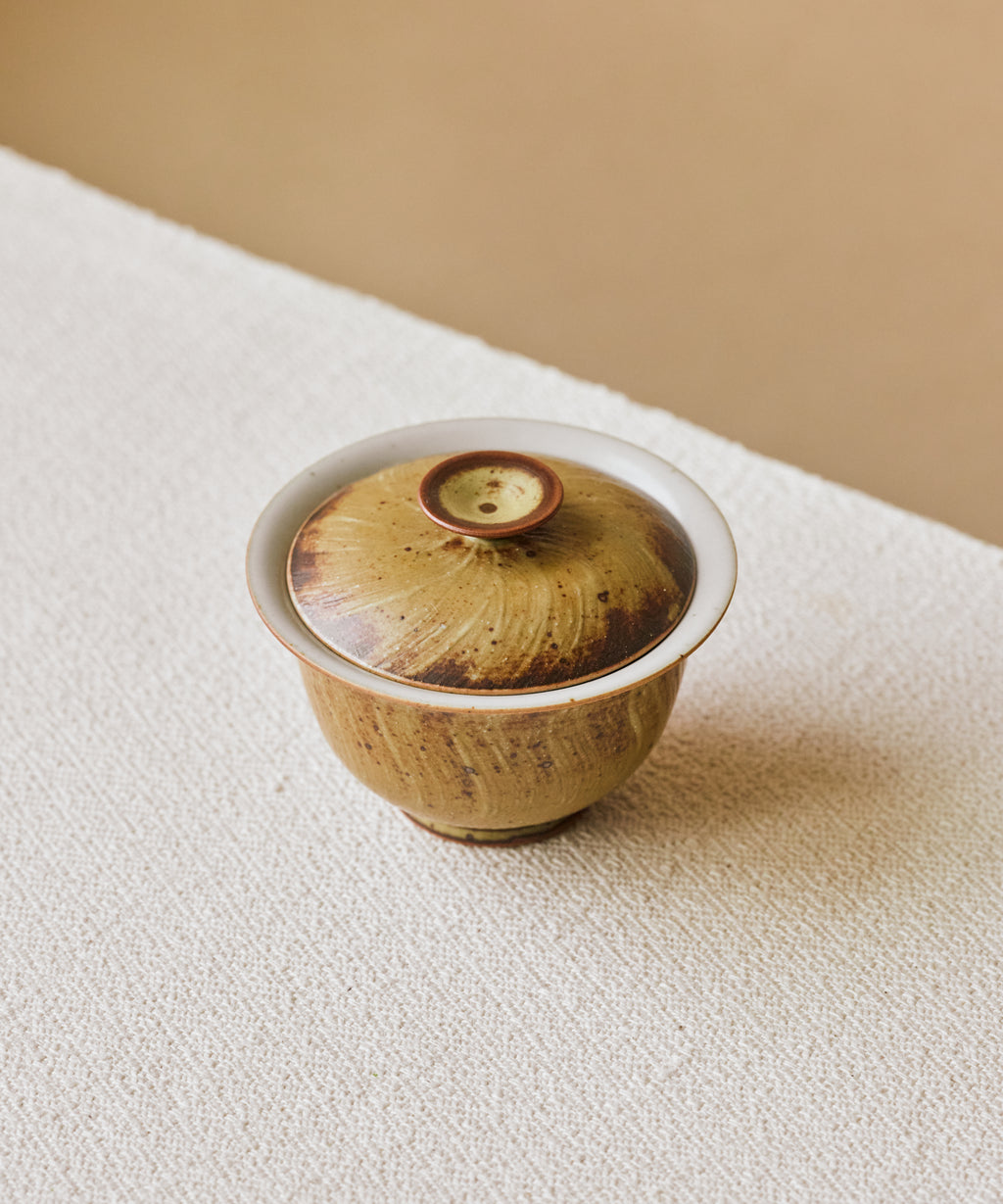 Gaiwan Earth II in hand, earthy brushstroke glaze, Wang Xinghua gongfu teaware, Jingdezhen