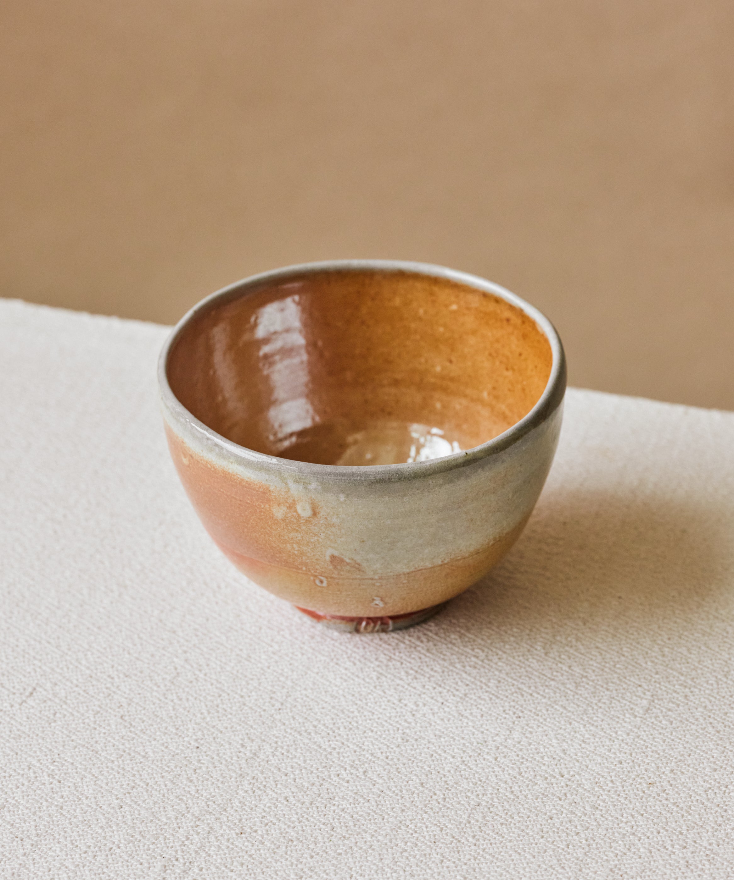 Chawan No. 69 in hand, soda-fired stoneware chawan