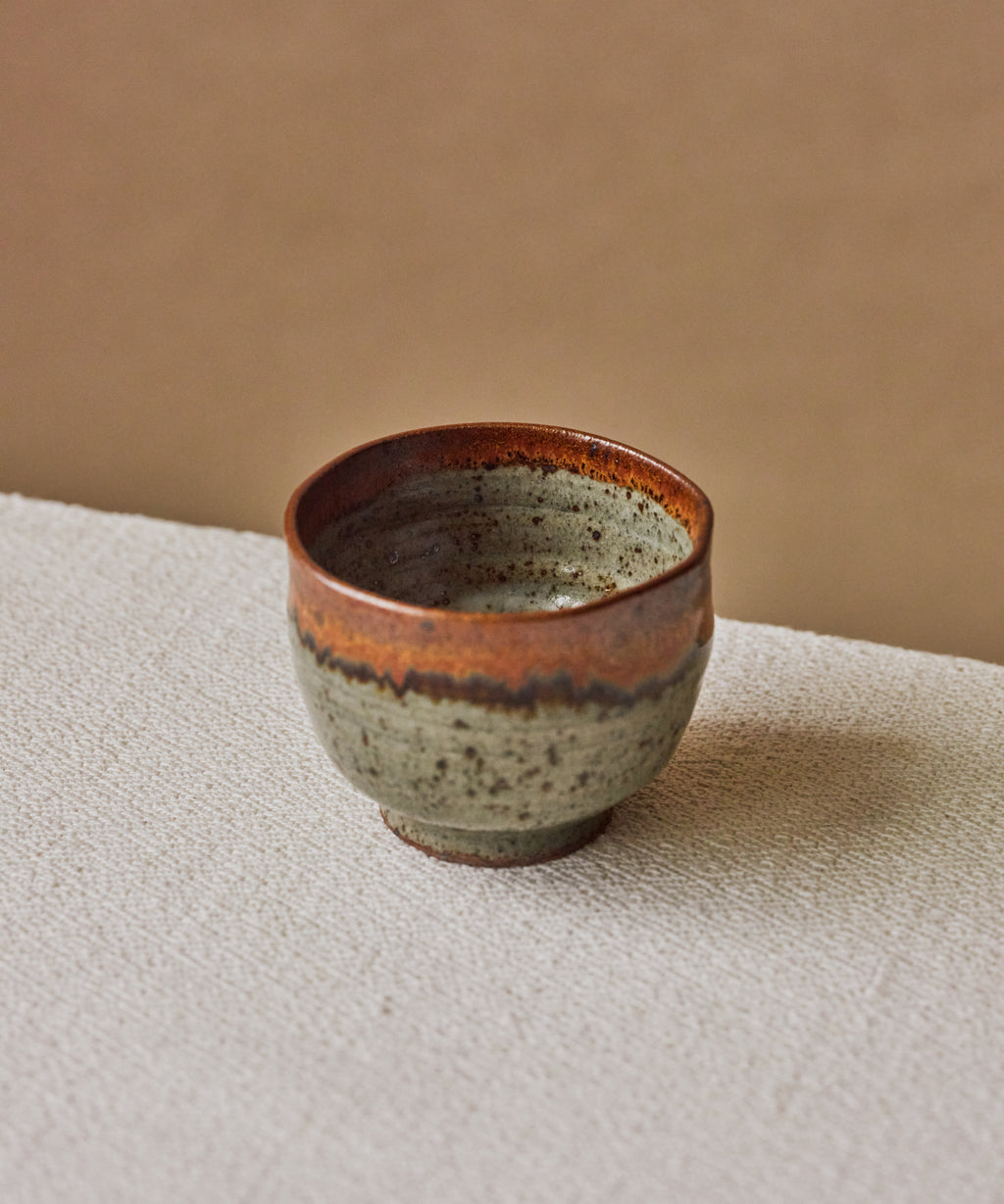Tea Cup Speckles in hand, mixed stoneware clay body with speckled glaze
