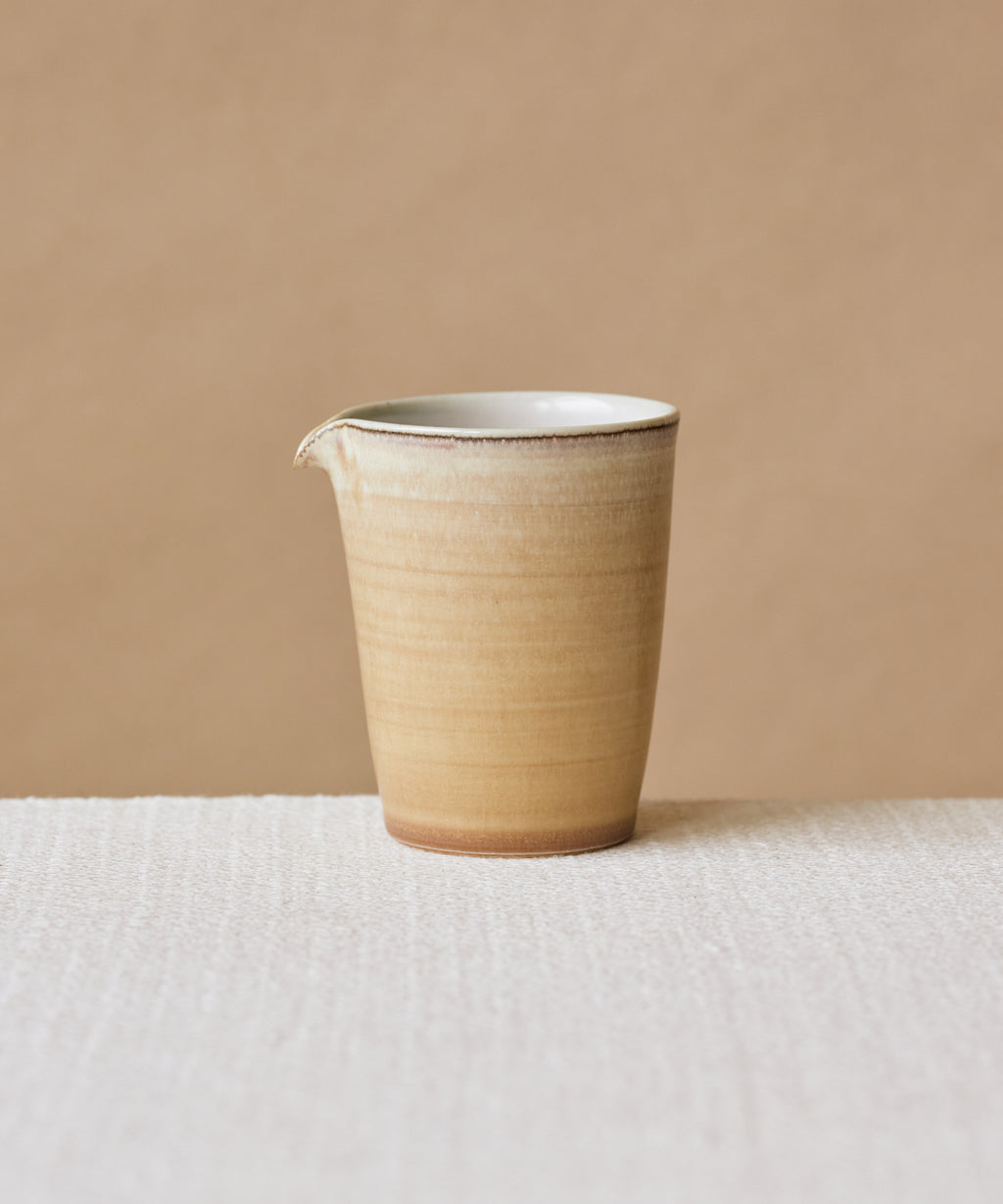 Clamshell Glaze Pitcher, handcrafted tea pitcher by Wang Xinghua, Jingdezhen, sand-toned glaze with calcification strata