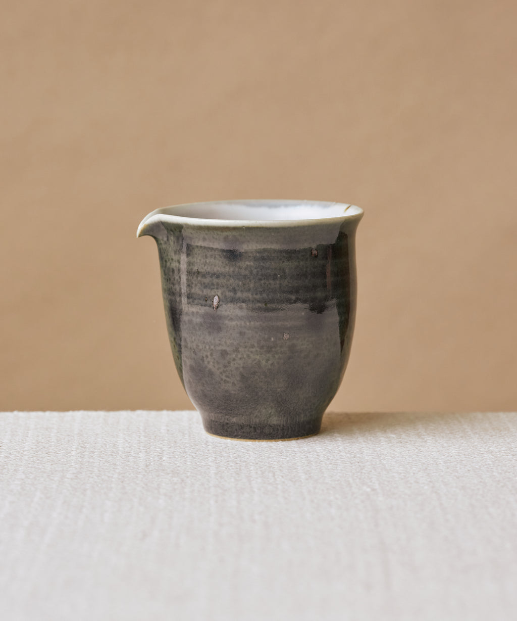 Ombre Blue Pitcher, handcrafted tea pitcher by Wang Xinghua, Jingdezhen, deep blue glaze with metallic kiln spots