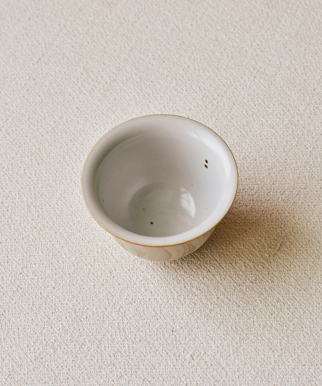 Matte Blush Gaiwan glaze detail, matte pink with sandy texture, reduction-fired at 1300°C, Jingdezhen