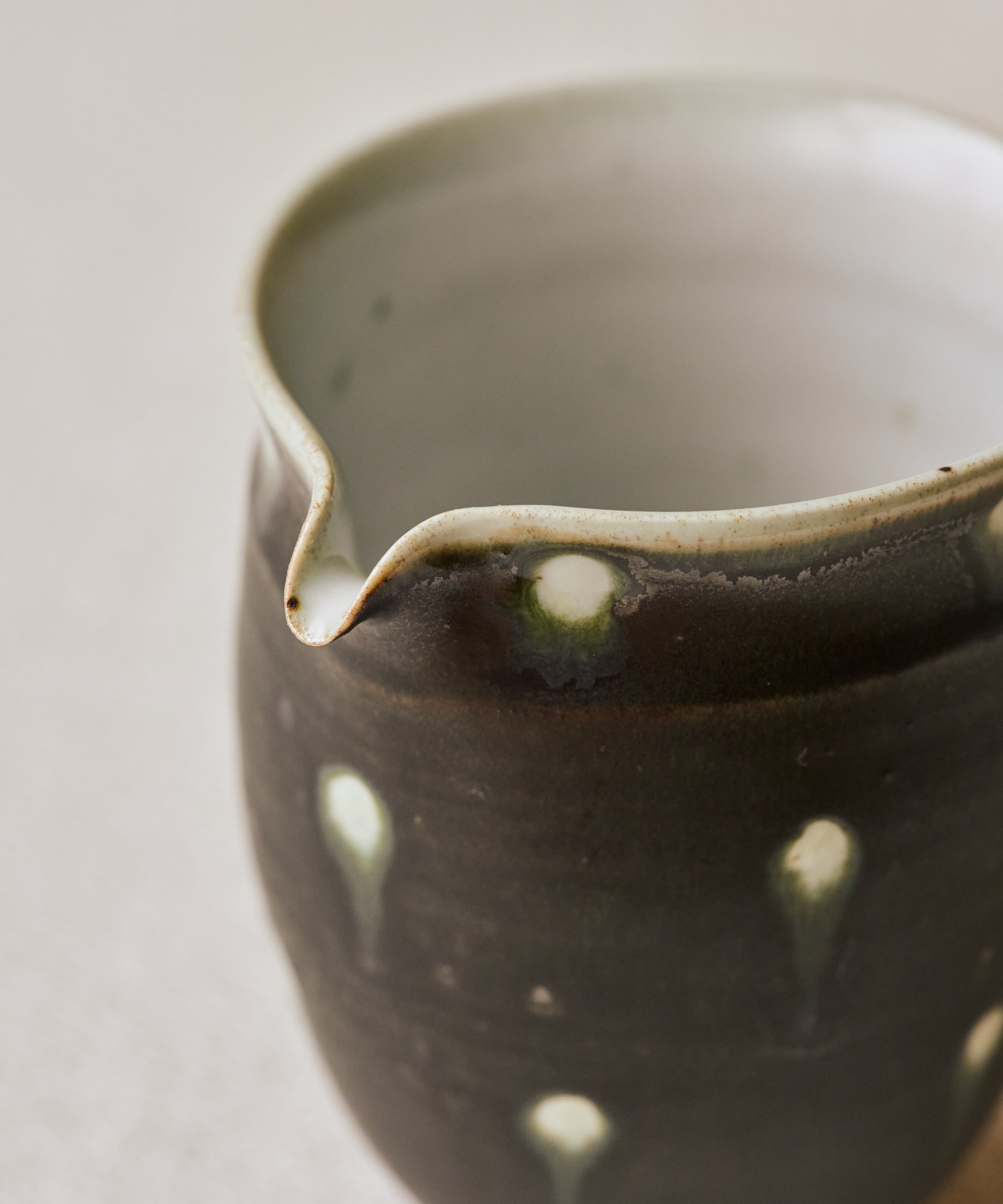 Black Peacock Pitcher Type I interior, white interior glaze, handcrafted by Wang Xinghua, Jingdezhen
