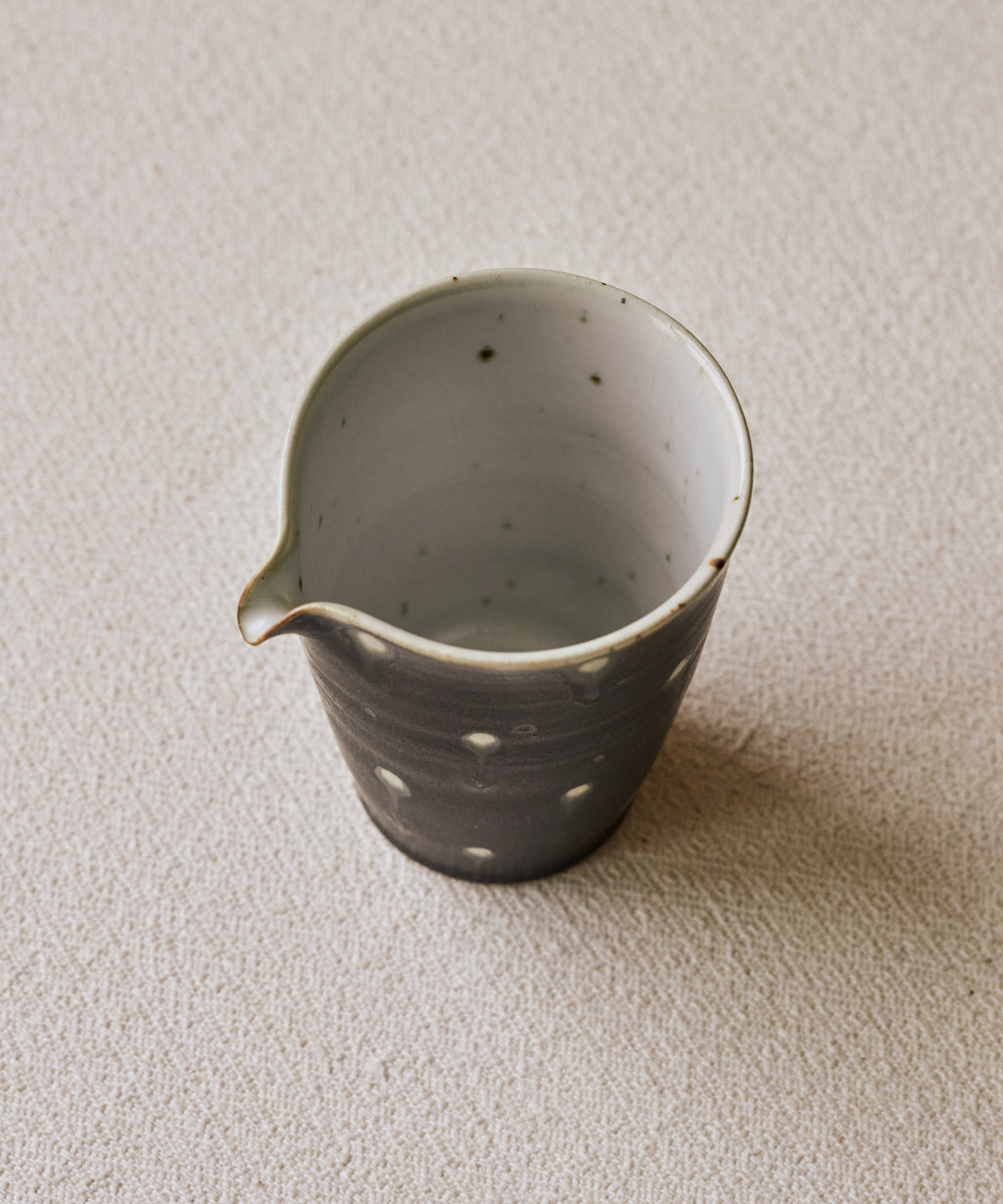 Black Peacock Pitcher Type II side view, black peacock glaze, Wang Xinghua, Jingdezhen porcelain