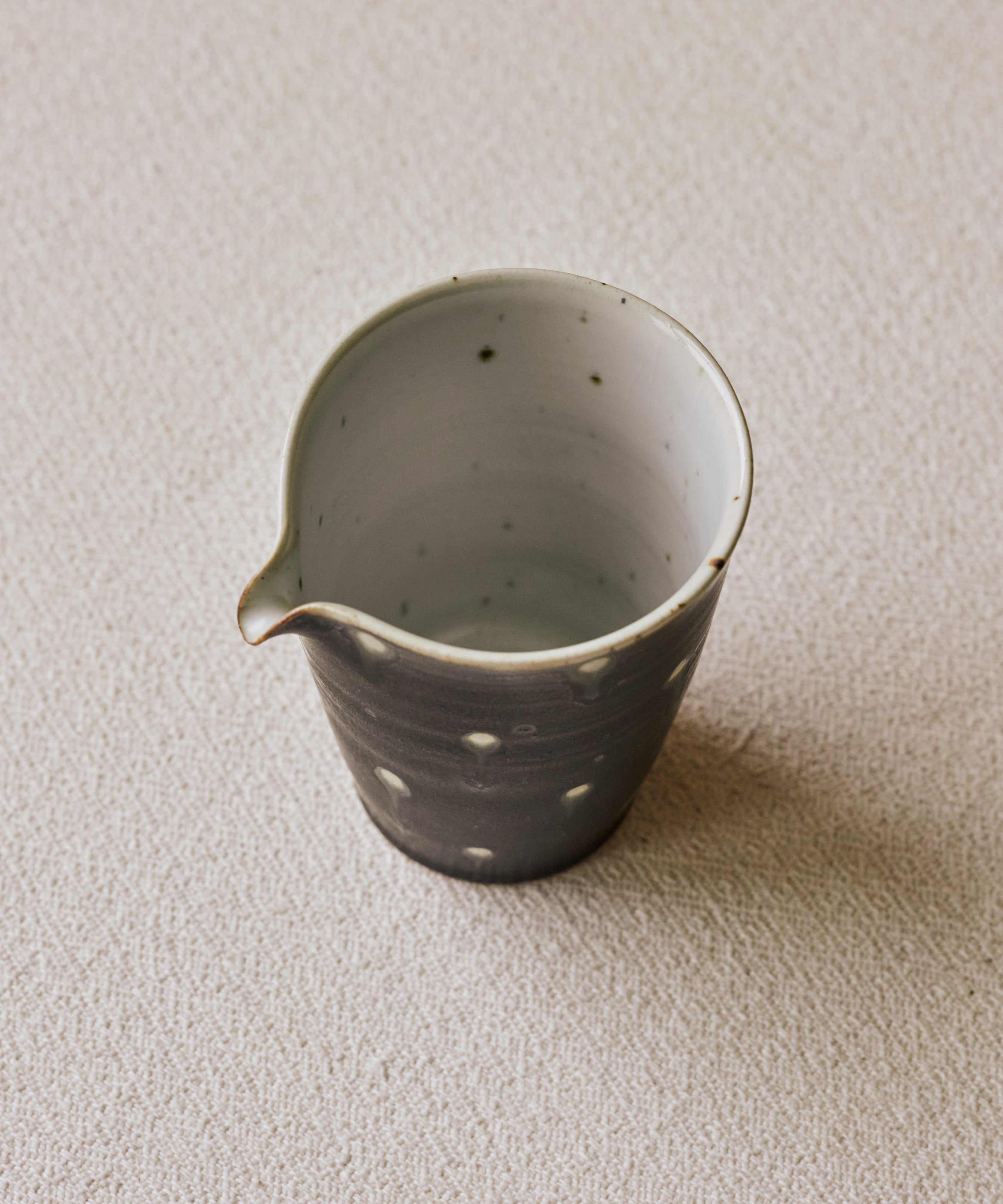 Black Peacock Pitcher Type II side view, black peacock glaze, Wang Xinghua, Jingdezhen porcelain