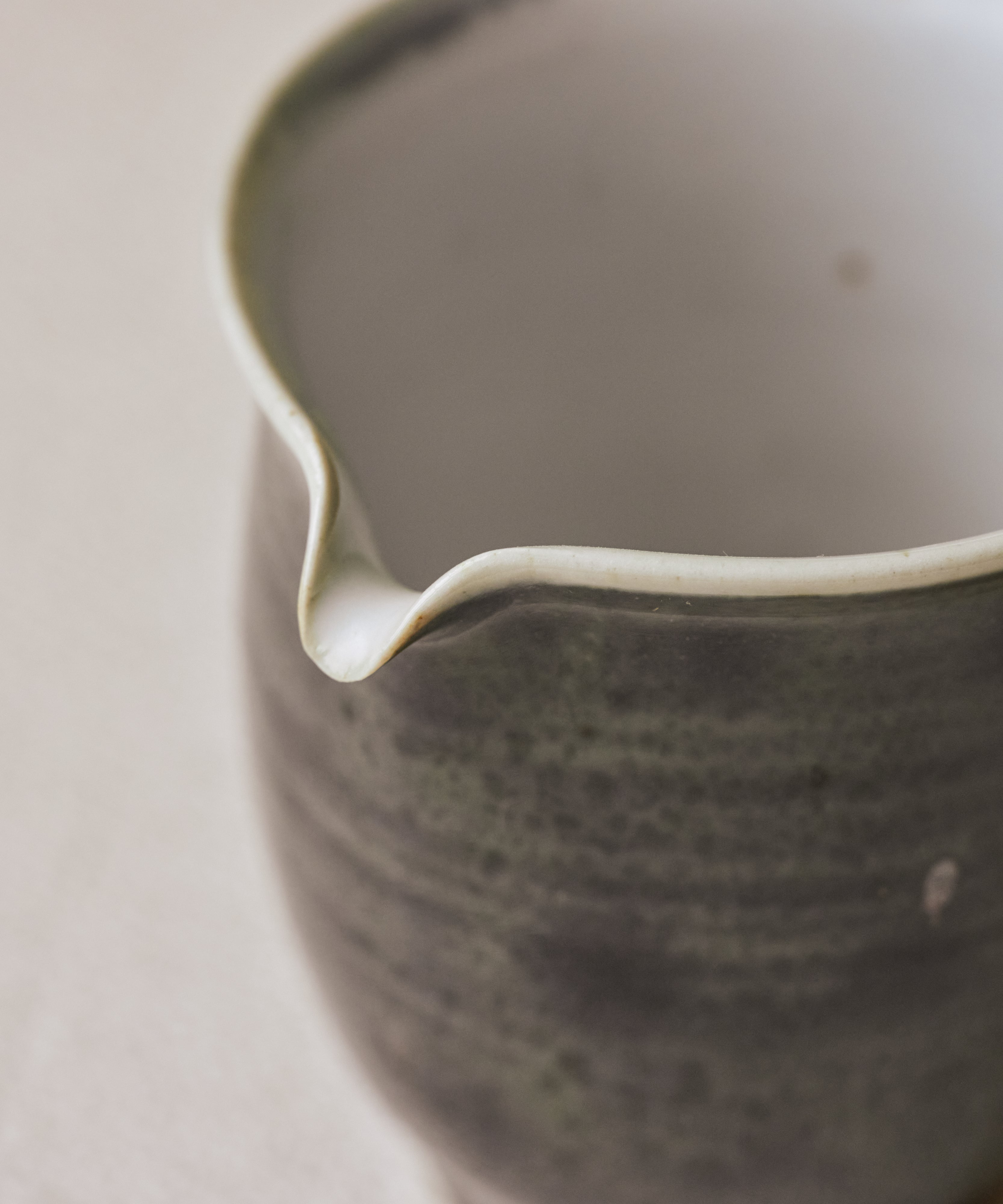Ombre Blue Pitcher glaze detail, metallic kiln spots suspended in deep blue, Jingdezhen clay and porcelain