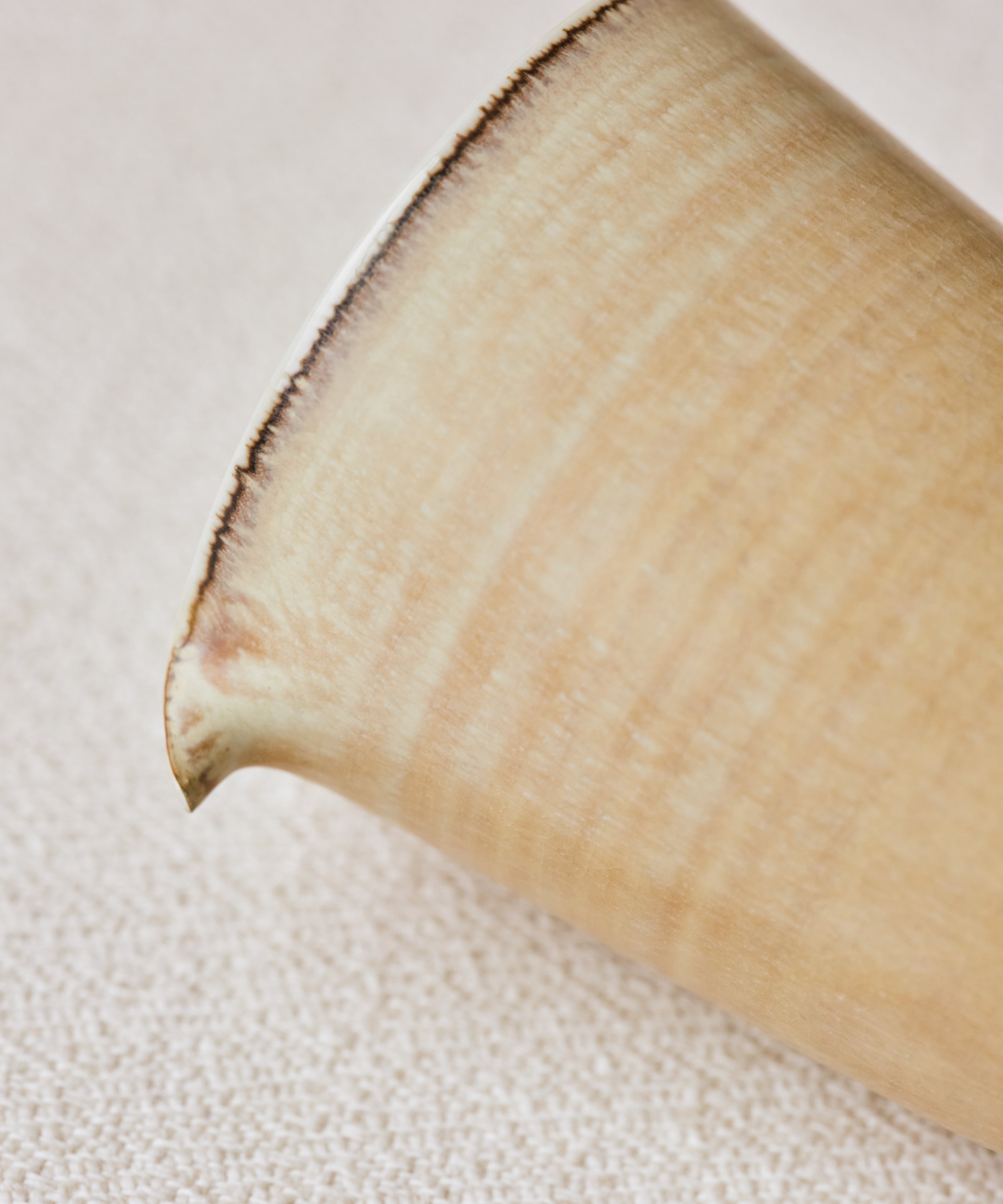 Clamshell Glaze Pitcher glaze detail, calcification-like strata on sand-toned surface, Jingdezhen clay and porcelain