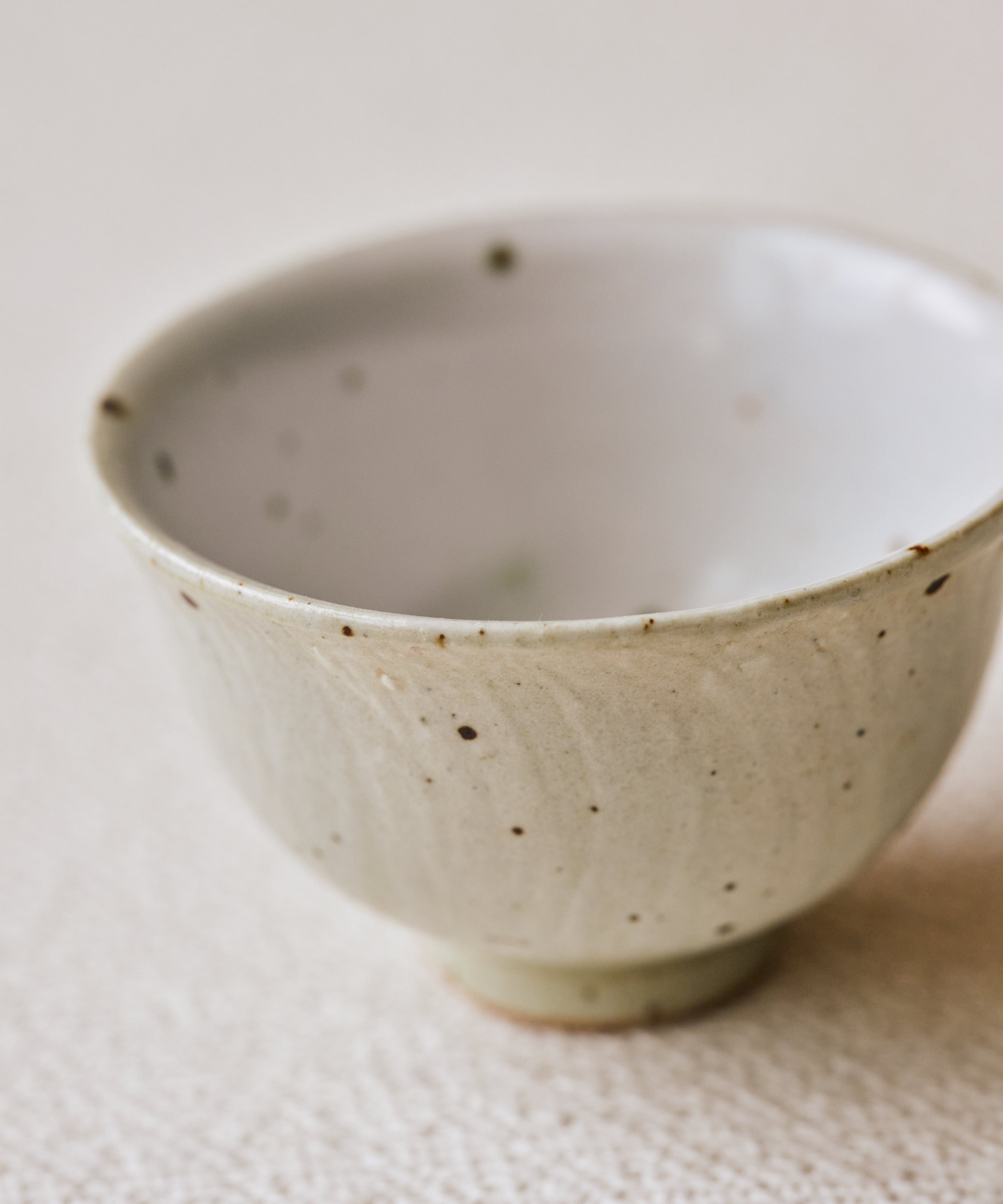 Rock Cup glaze detail, copper kiln spots on cement-like surface, Jingdezhen clay and porcelain
