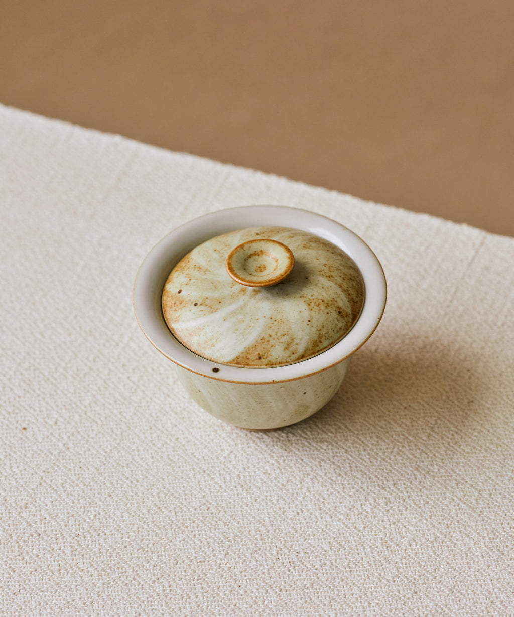 Ecru Brushstroke Gaiwan in hand, soft tone with sweeping variegation, Wang Xinghua gongfu teaware