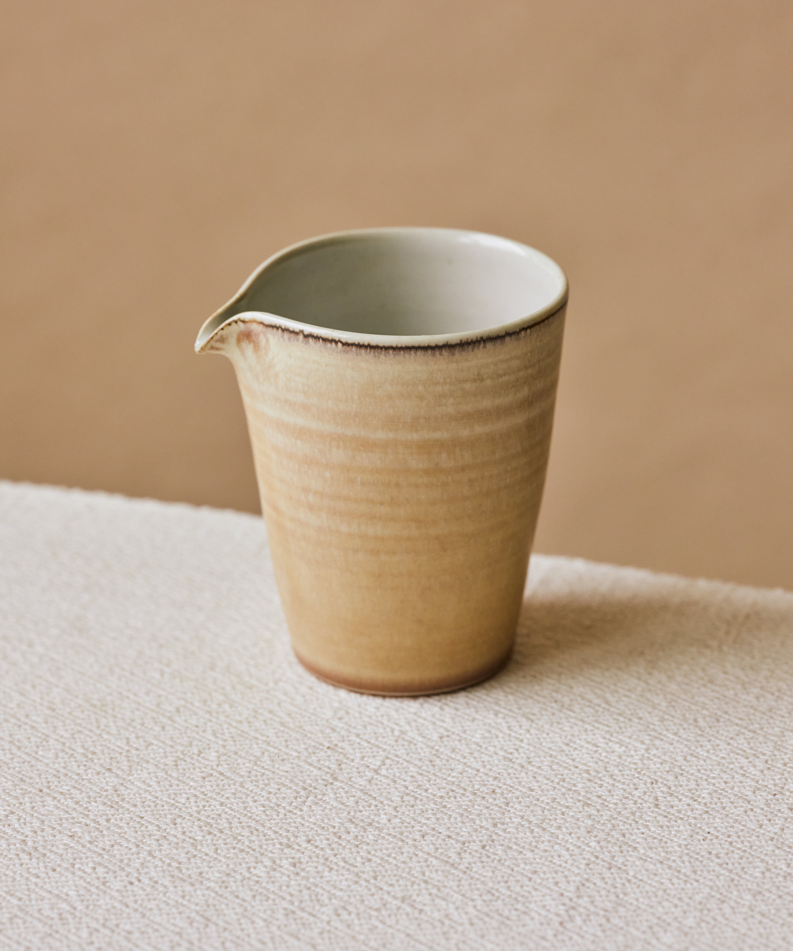 Clamshell Glaze Pitcher spout detail, precise curved spout for controlled pours, Jingdezhen porcelain
