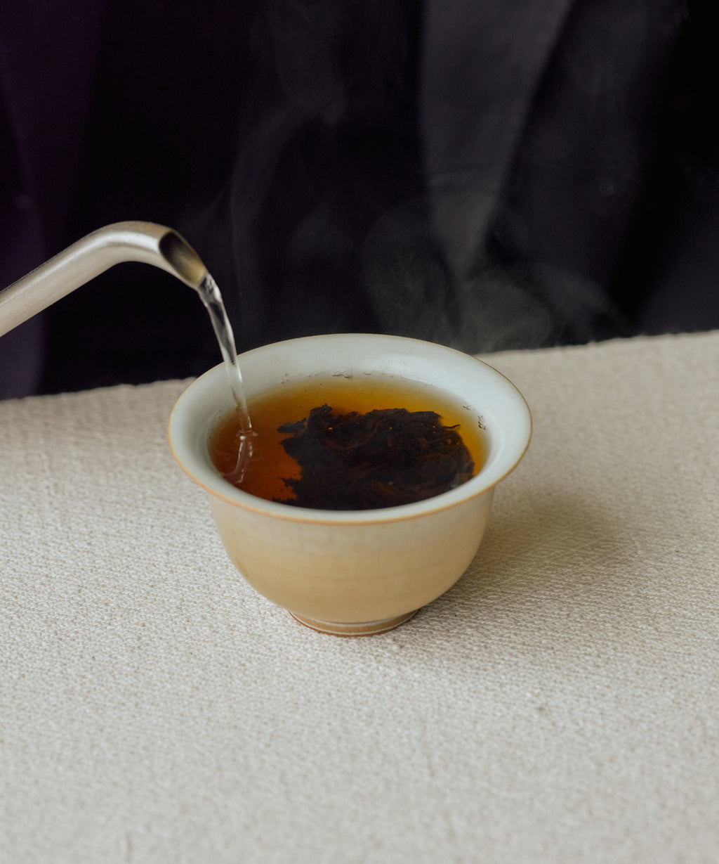 Charcoal Roasted Tibetan Tea steeping, releasing toffee cake aroma