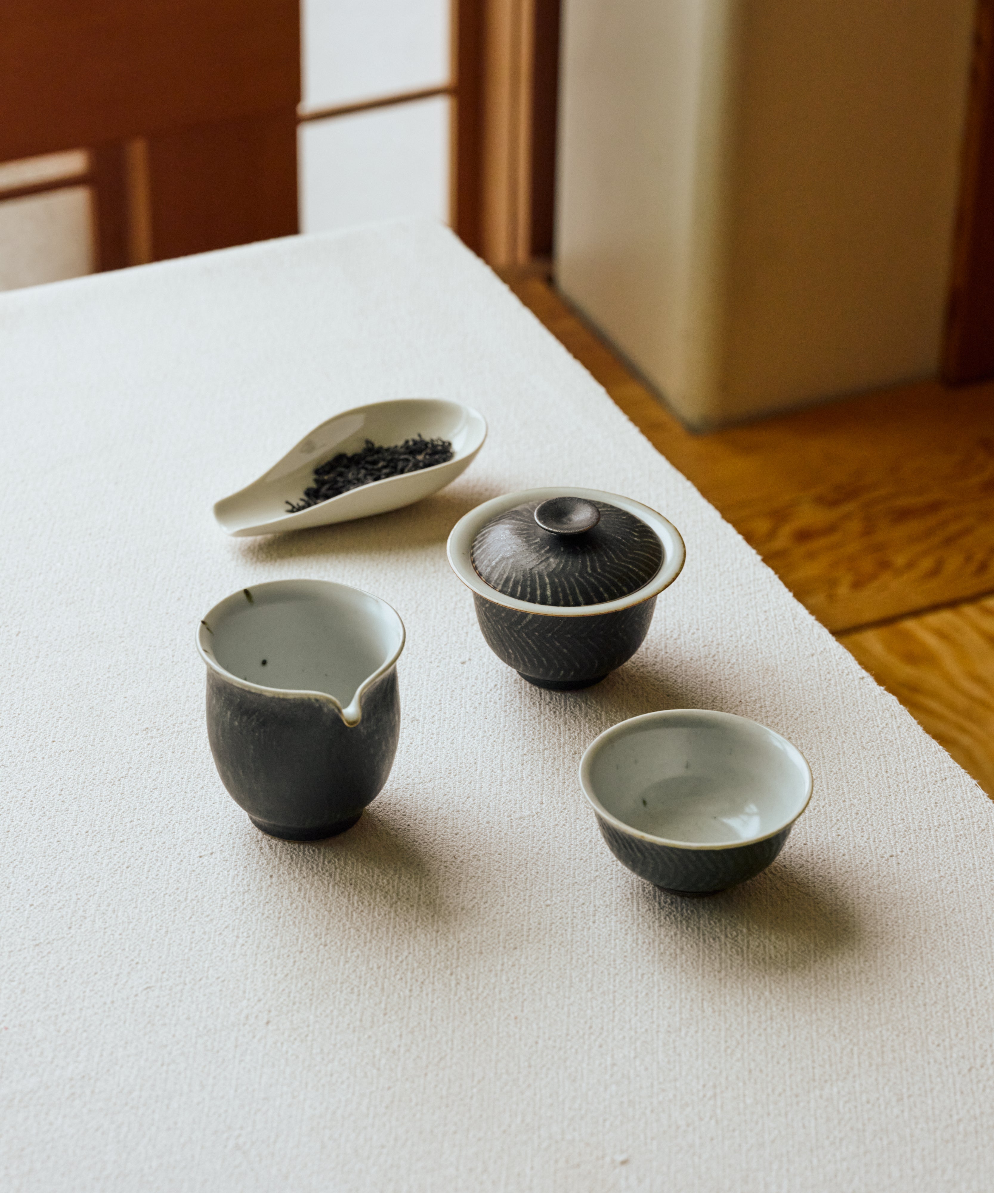 Detail of Jasmine Tibetan Tea showing fermented dark leaves scented with jasmine
