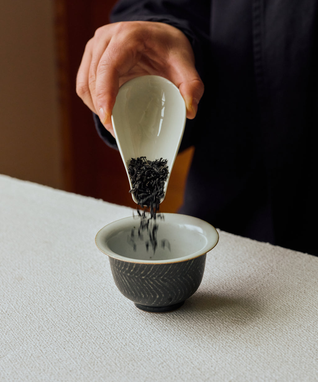 Jasmine Tibetan Tea leaves in a gaiwan ready for brewing