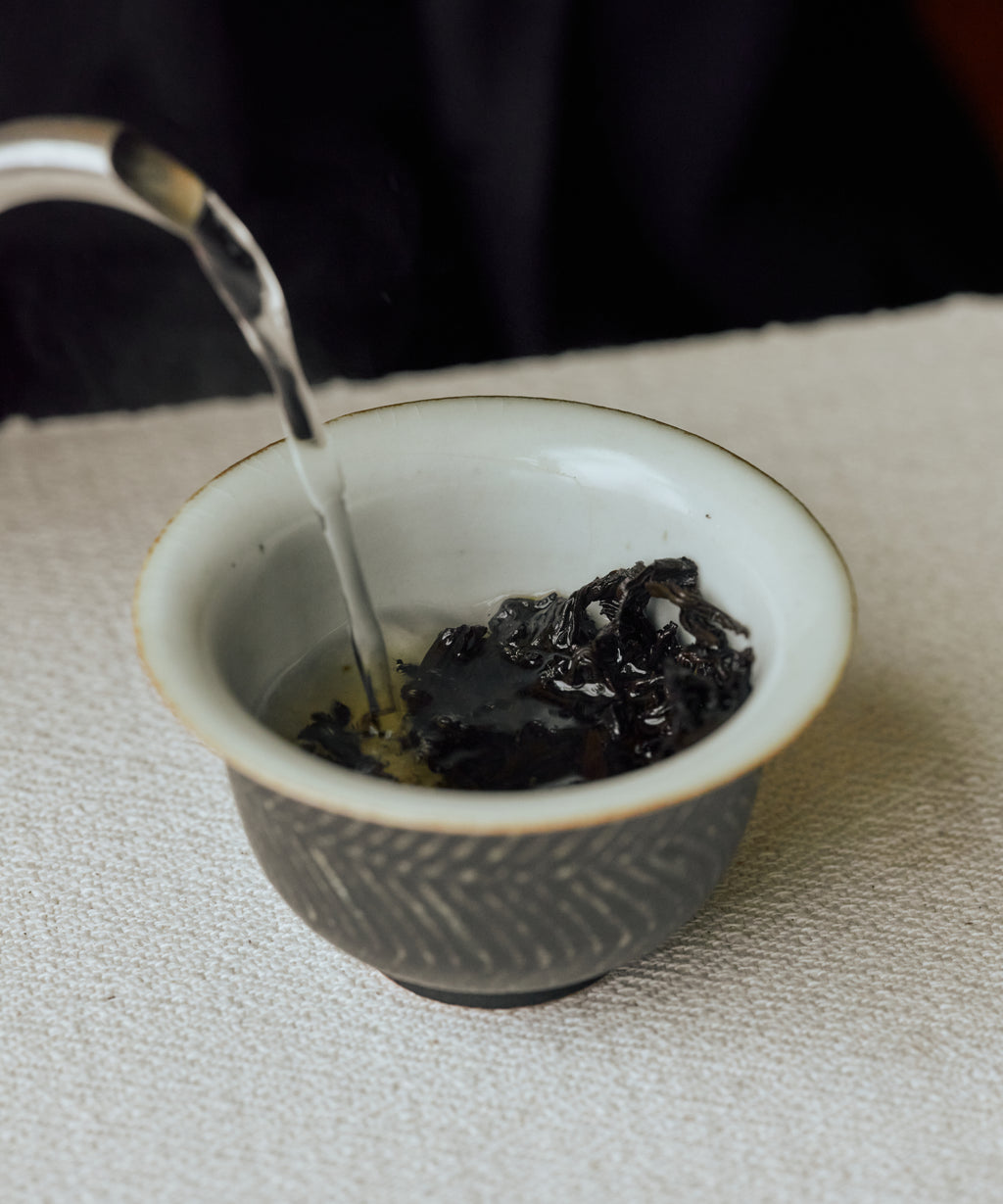 Jasmine Tibetan Tea steeping, releasing intoxicating jasmine and baked tea aroma