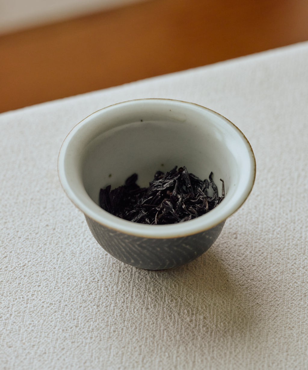 Brewed Jasmine Tibetan Tea poured from gaiwan