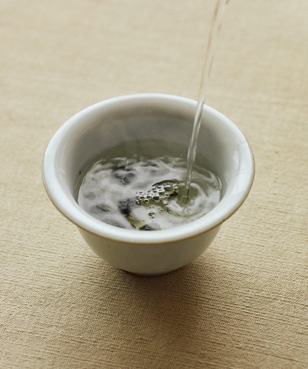Jinxuan Milk Oolong leaves — ball-rolled Taiwanese oolong from cloud-covered Alishan gardens