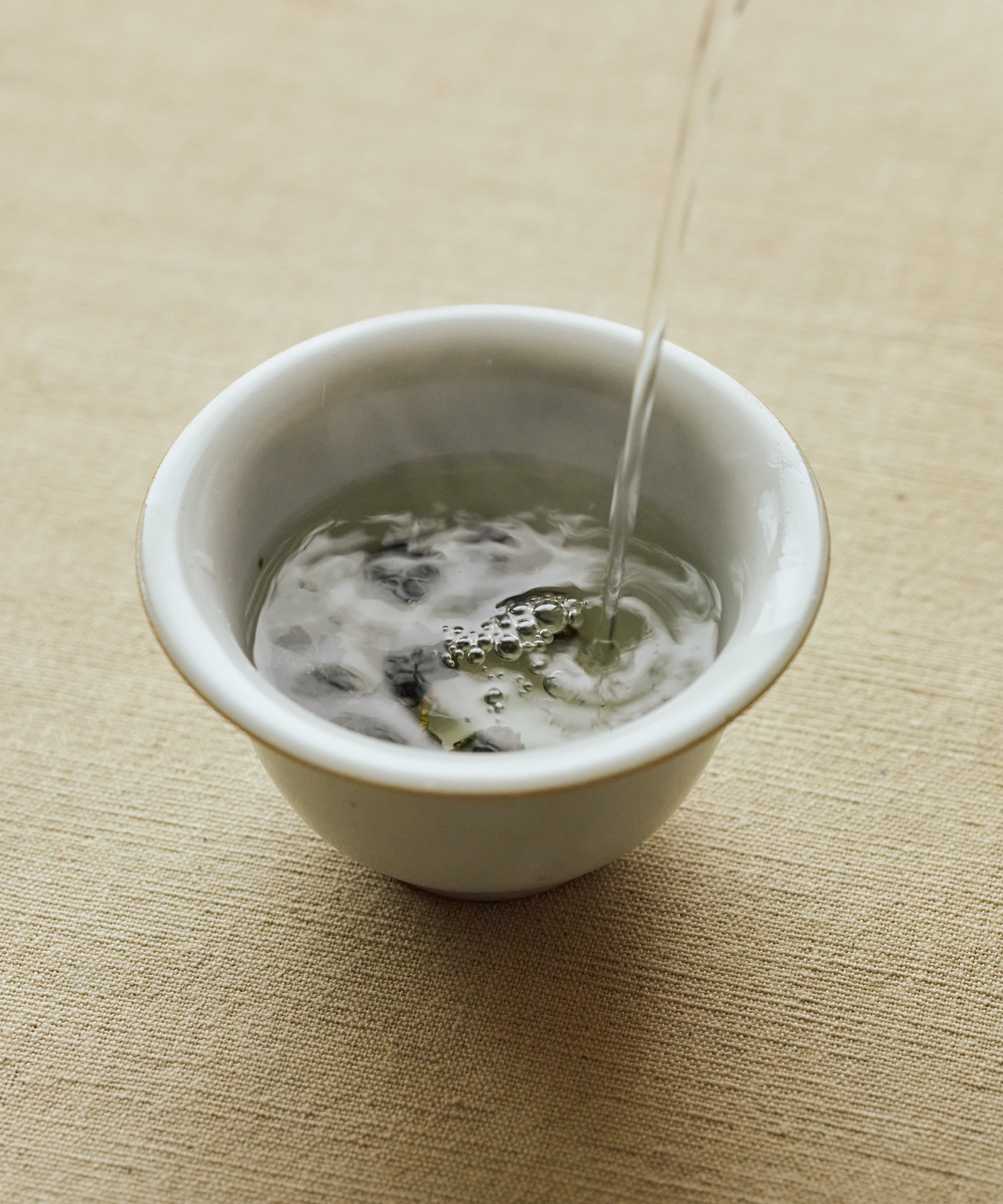 Jinxuan Milk Oolong leaves — ball-rolled Taiwanese oolong from cloud-covered Alishan gardens