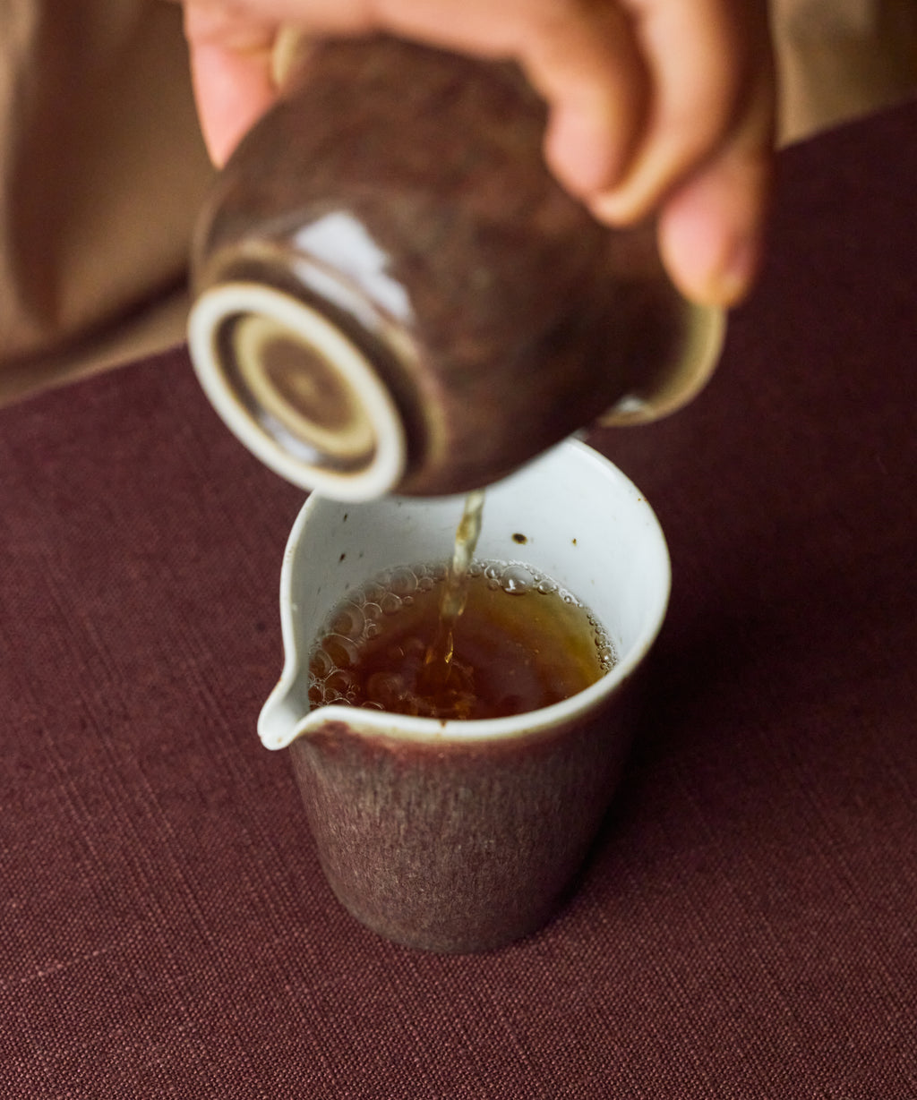 Black Oolong wet leaves after brewing — heavily bruised and oxidized Golden Cassia, Anxi, Fujian