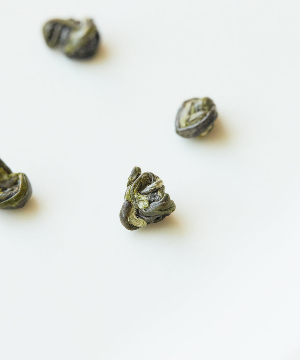 Brewing Huoqing Fire Jade — adding rolled pearls to vessel, only 50kg crafted per year