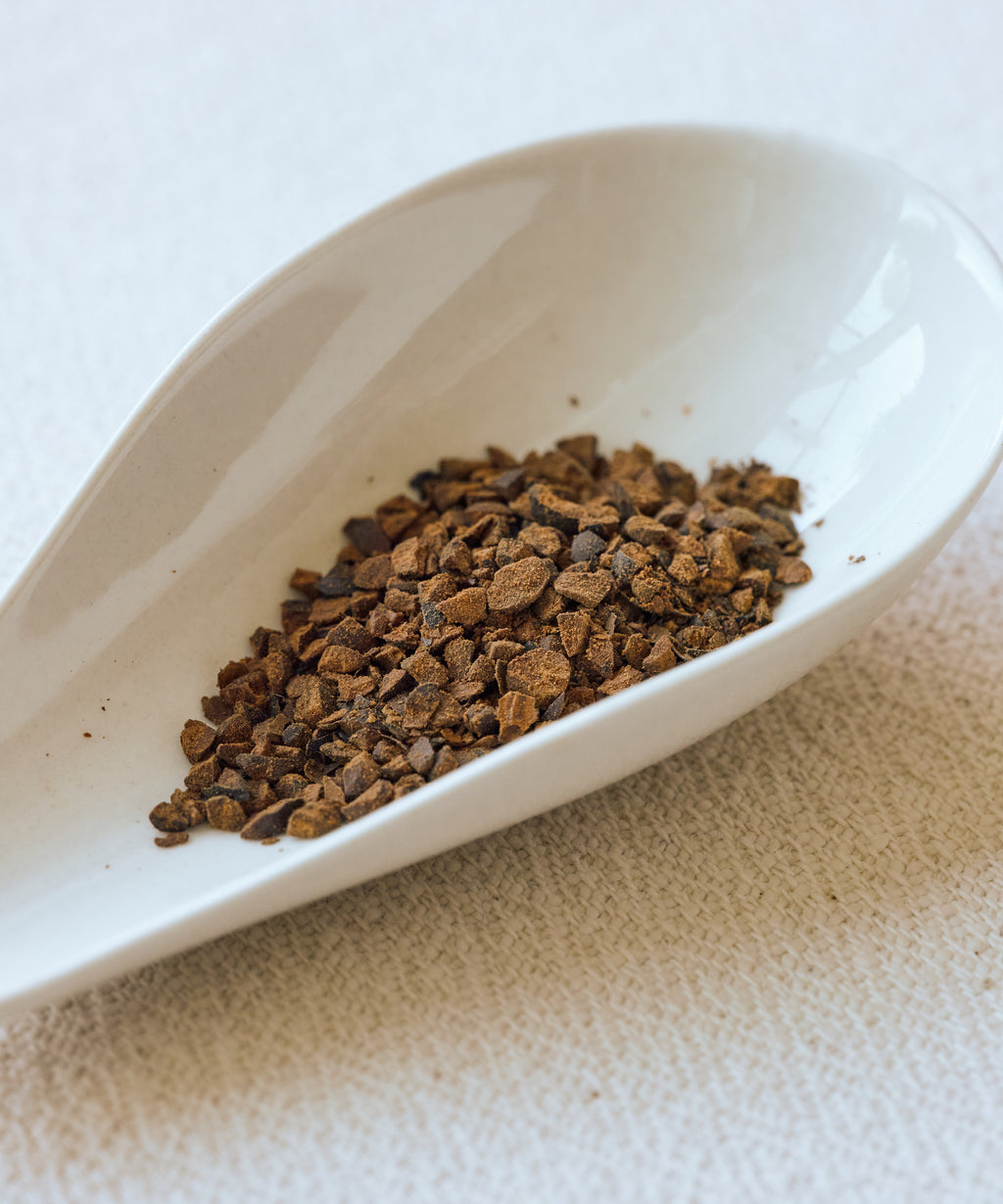 Detail of Tamba Roasted Black Bean showing the broken bean pieces resembling crumbled cacao
