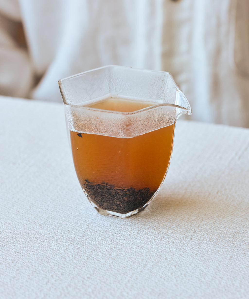Tamba Roasted Black Bean pieces in a vessel ready for brewing