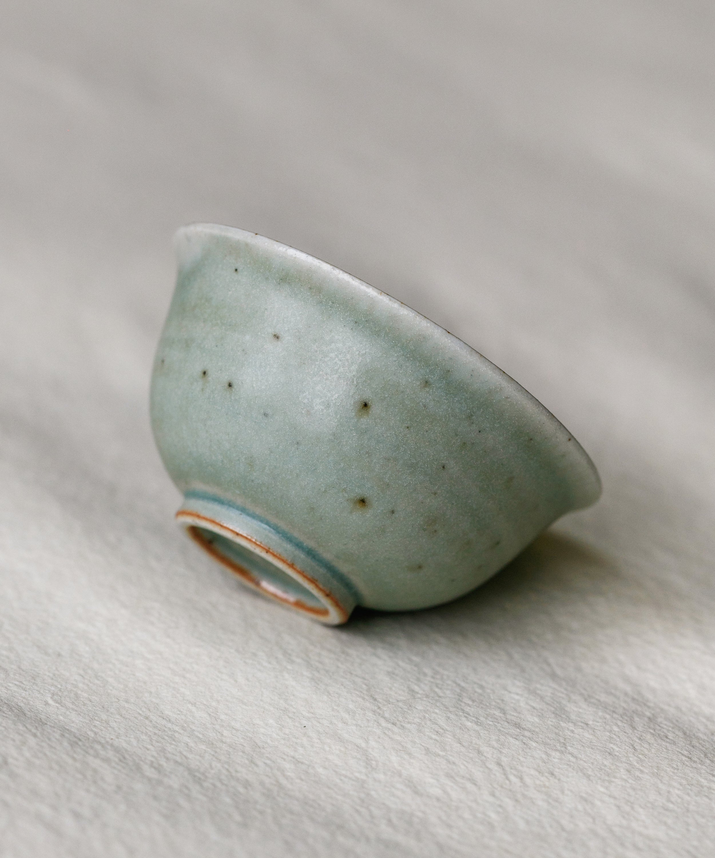Celadon Green Cup in hand, celadon green glaze, Wang Xinghua gongfu teaware, Jingdezhen