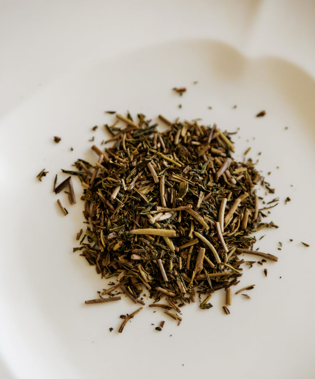 Noma Koshun dry hojicha leaves and stems on a white dish