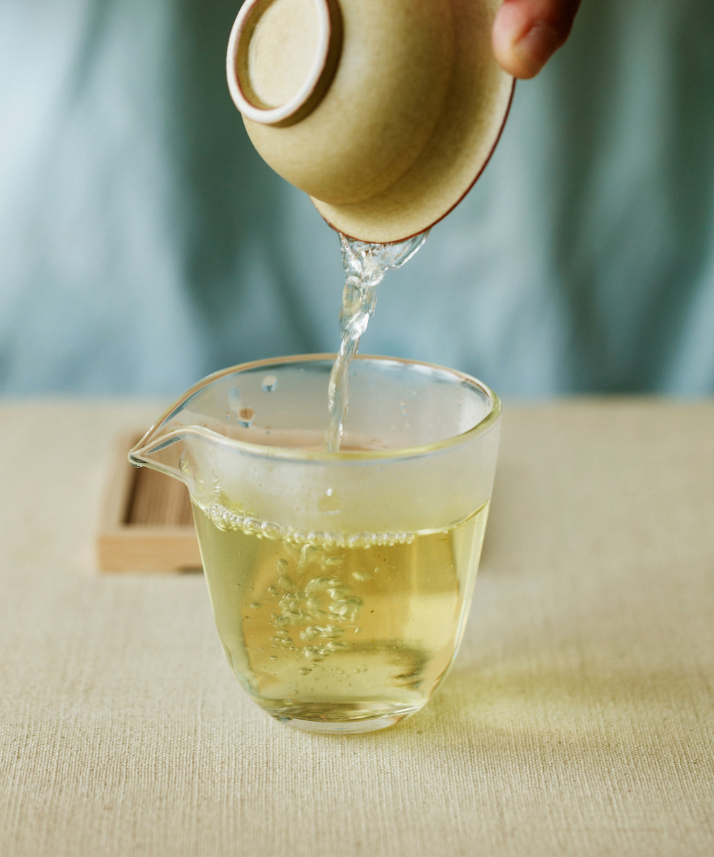 Laoshan Green brewed liquor — champagne colour, saline and nutty with honeyed cereal undertone