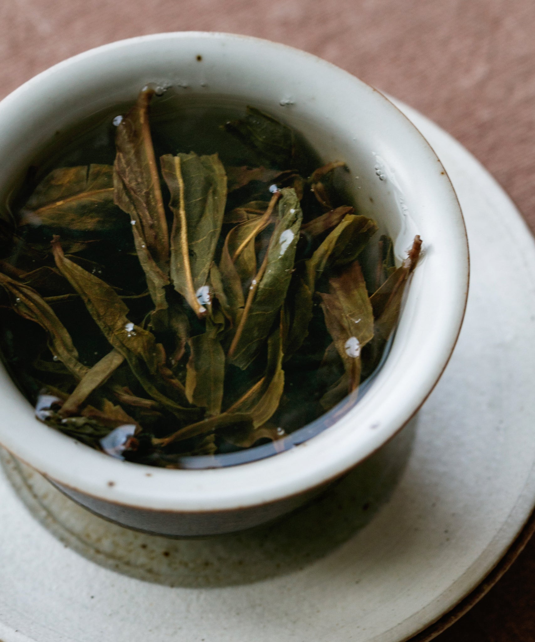 Yi Yi Rice liquor with charcoal notes, earthy sweetness, and uplifted finish, Chaozhou Phoenix oolong