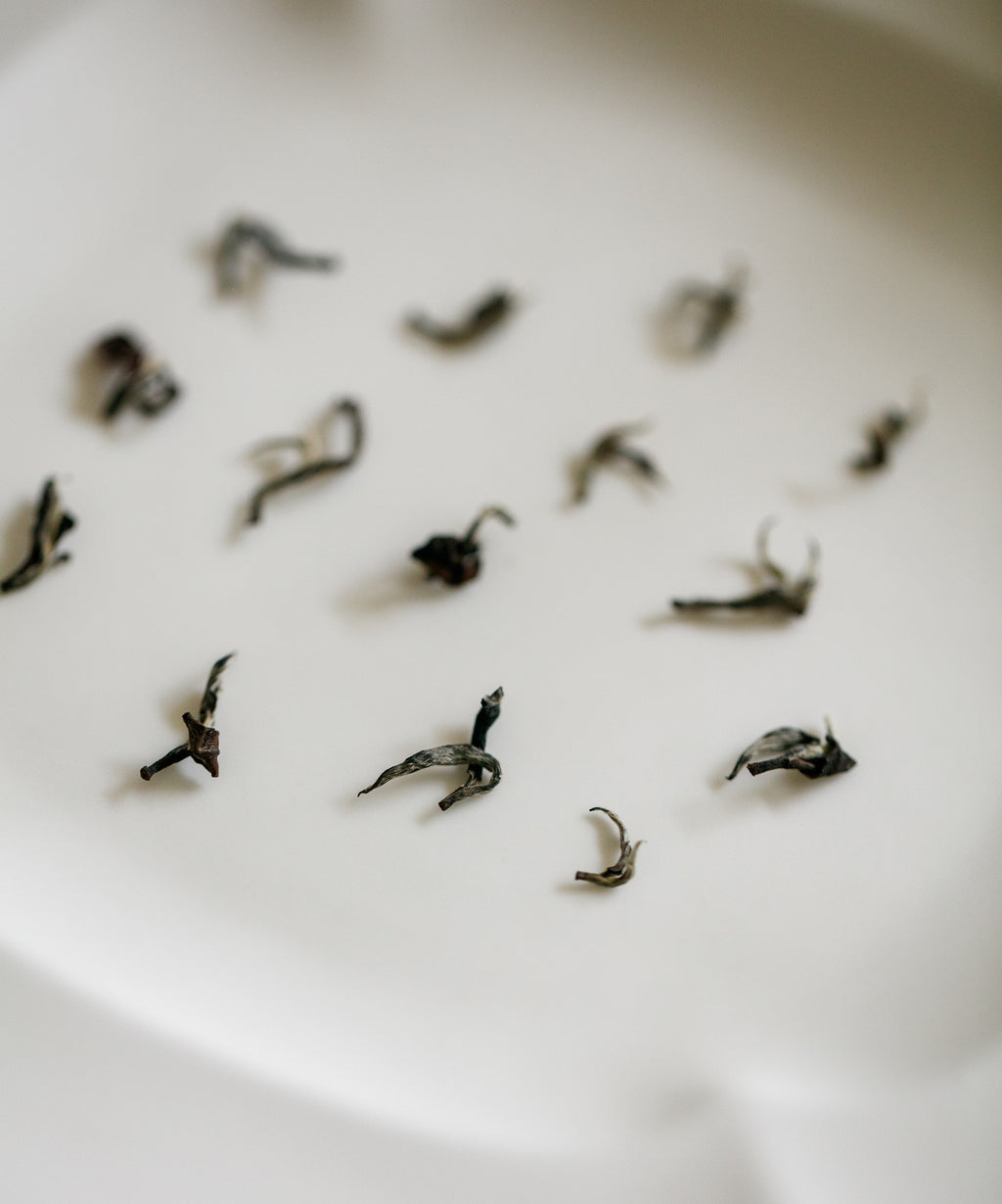 Oriental Beauty Silver dry leaves — variegated silver and dark-red bug-bitten oolong from Hsinchu, Taiwan
