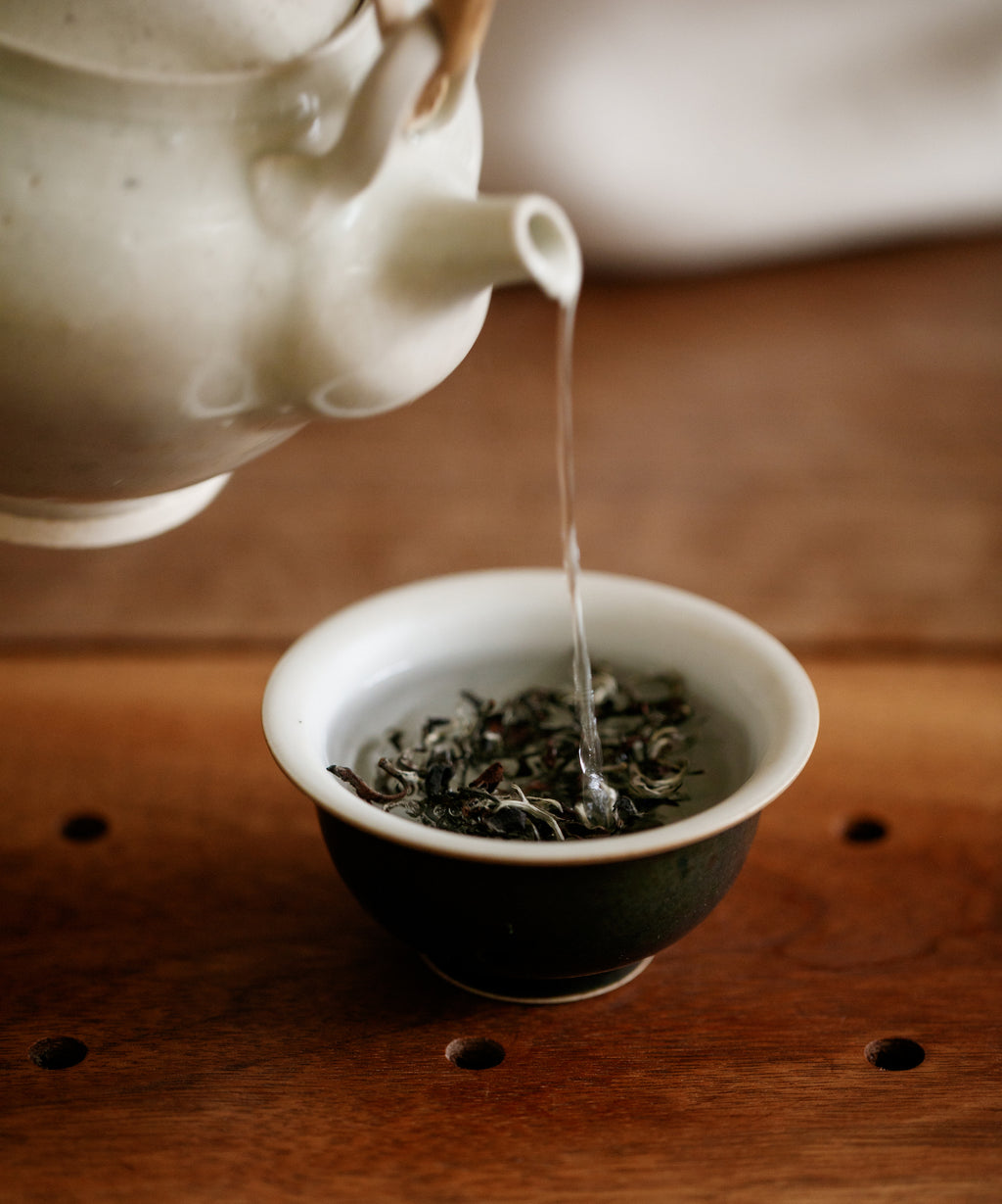 Oriental Beauty Silver wet leaves — deep sandalwood-coloured leaves, E'mei, Hsinchu, Taiwan