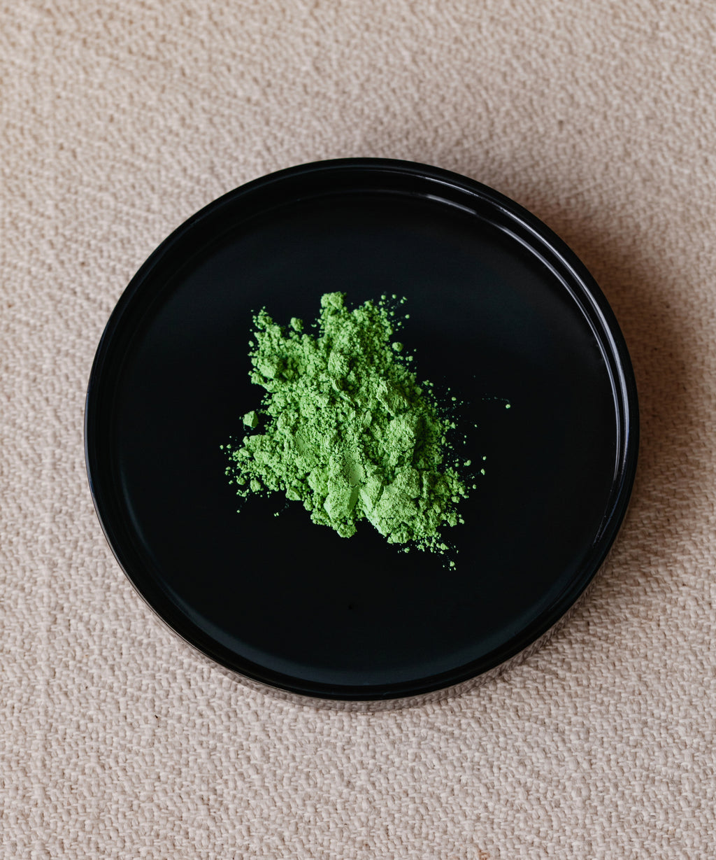 Matcha Hana Japanese latte grade matcha powder from Nishio in black bowl