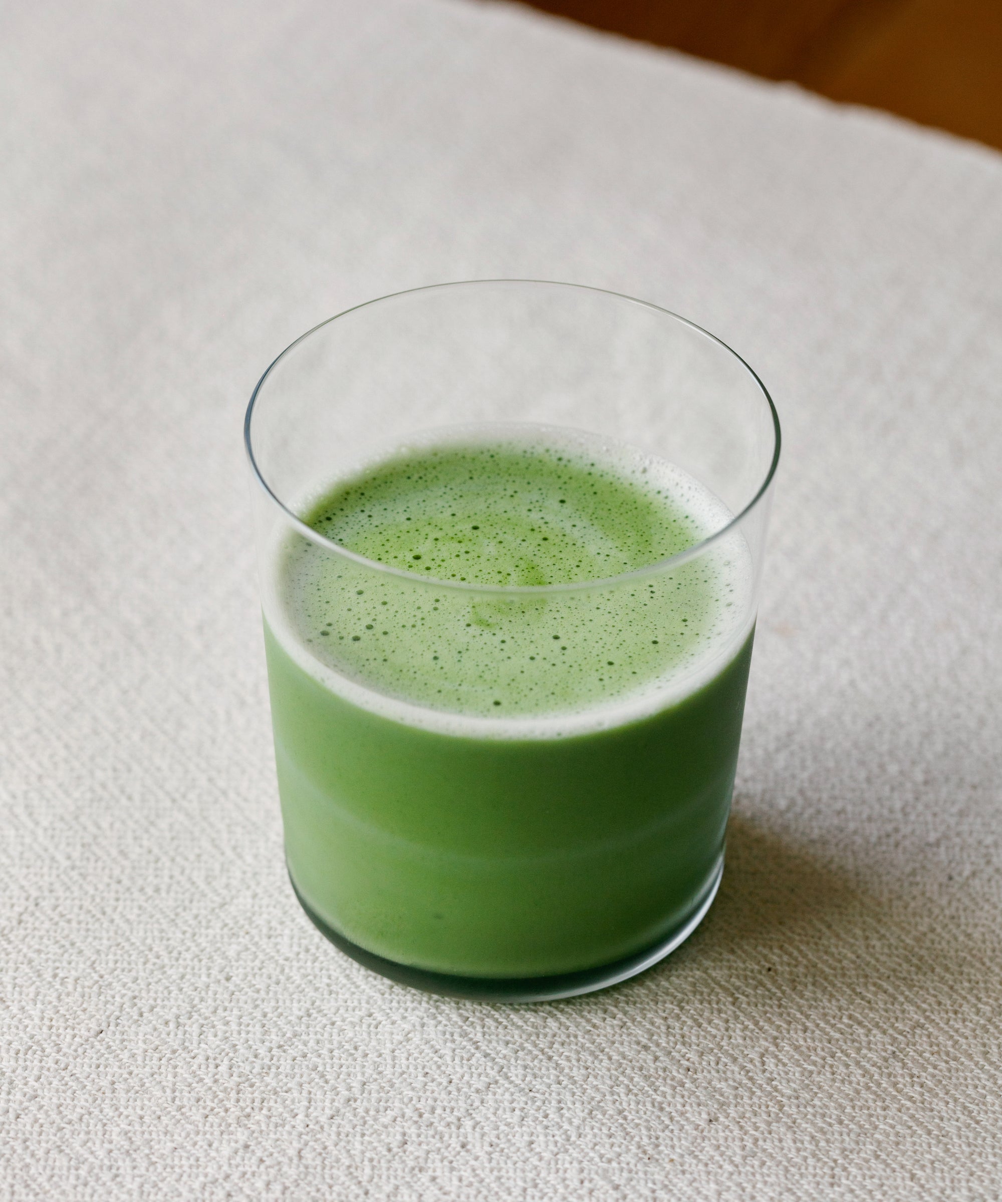 Iced Matcha Hana latte in glass with oat milk