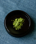 Matcha Yamabuki premium Japanese latte grade matcha powder in black ceramic bowl
