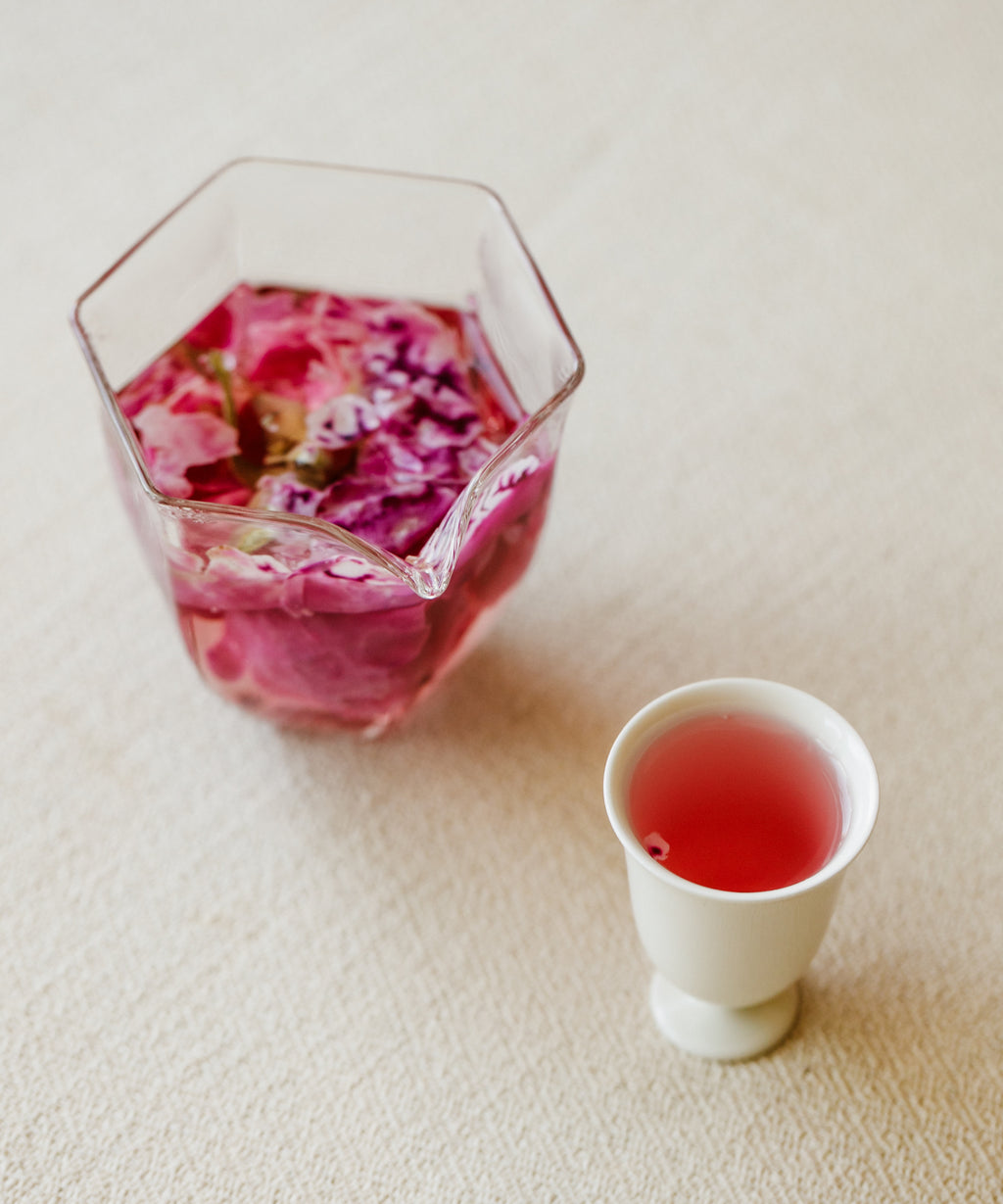 Organic crimson rose buds prepared for tea service