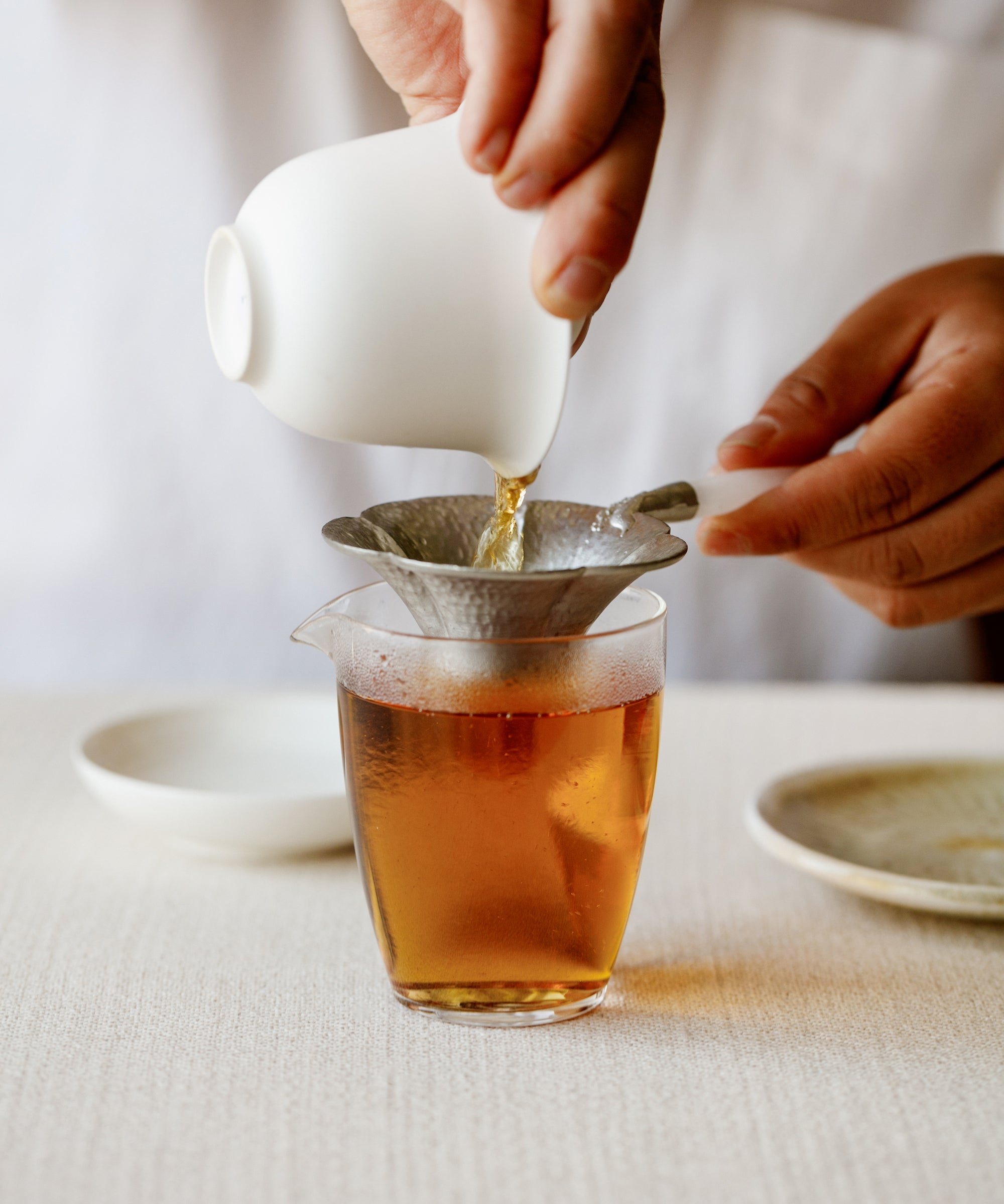 Rose Keemun Gold golden orange liquor with vivid rose oil and petal flavour, Qimen, Anhui black tea