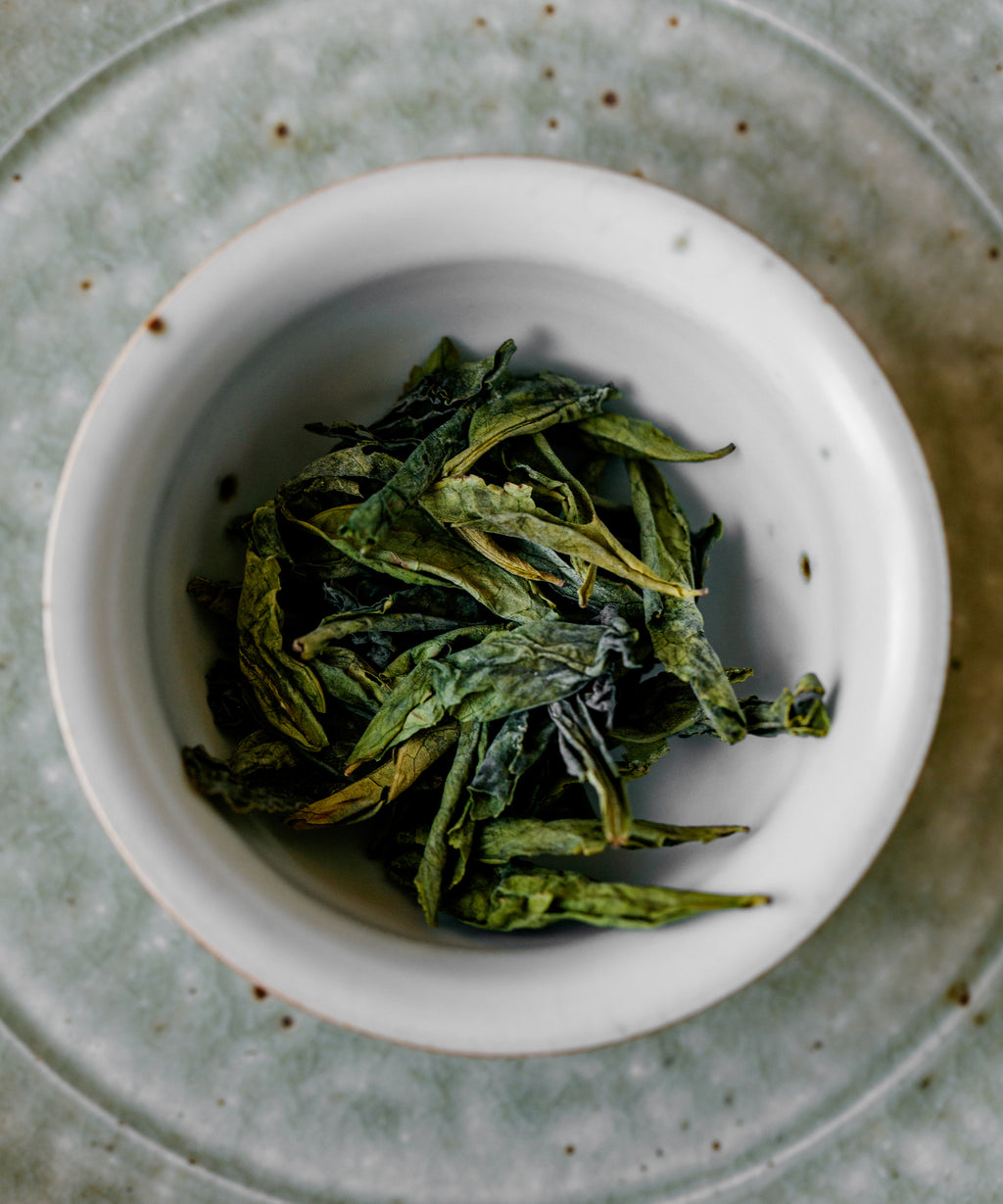 Melon Flake glowing yellow liquor with dense mouthfeel and toasted genmaicha-like aftertaste, Anhui green tea