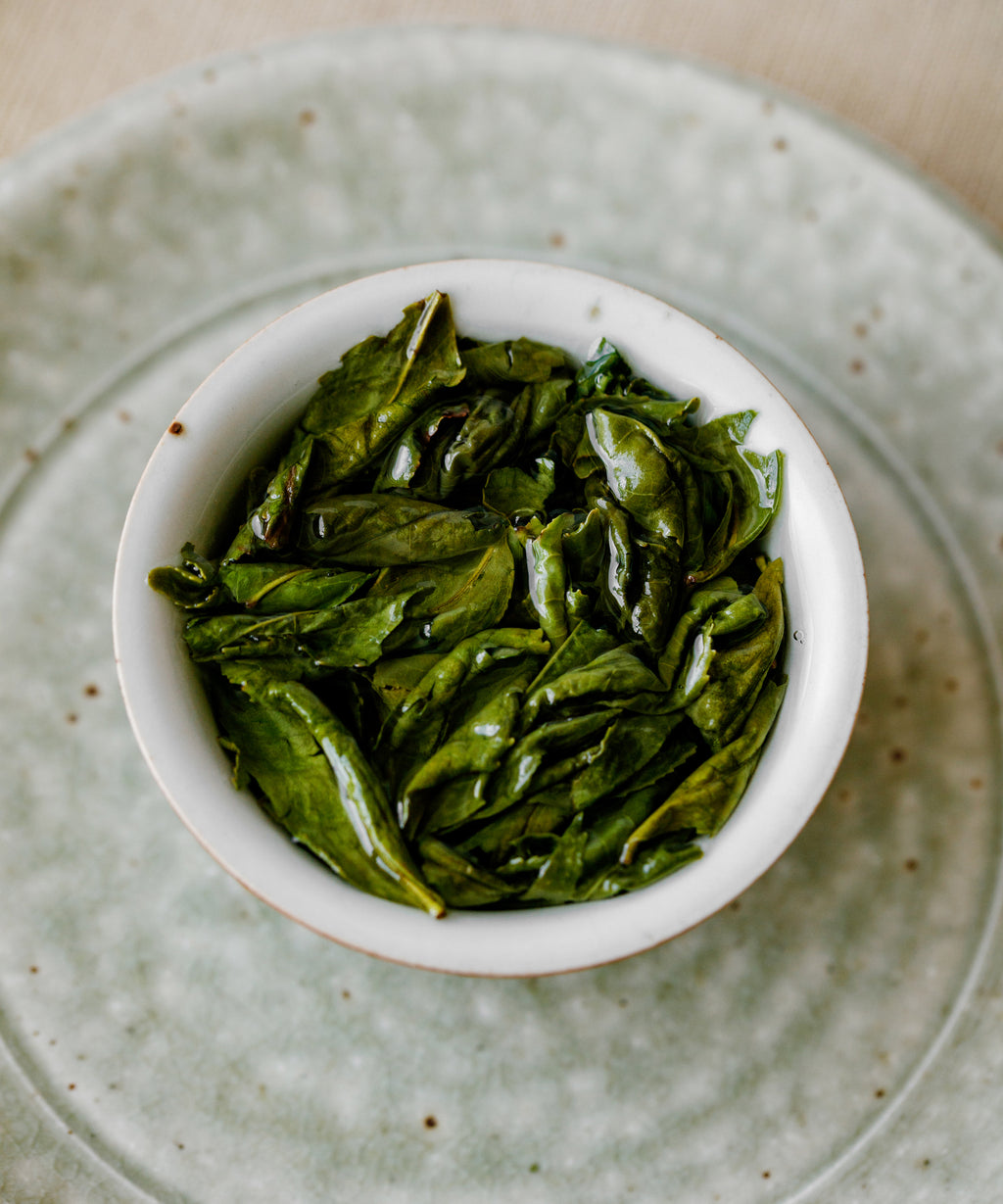 Melon Flake wet leaves after brewing, broad expanded leaves from Qitoushan, Lu'an, Anhui