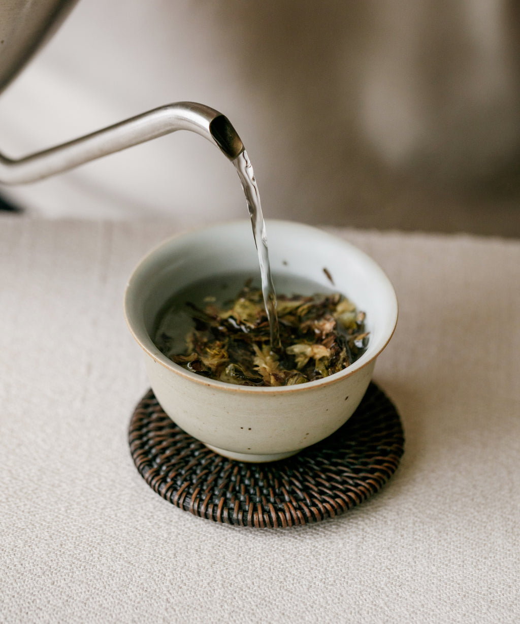 Jasmine Wild White tea cake with jasmine flowers — Mr. Fan's foraged tea from abandoned 1970s trees