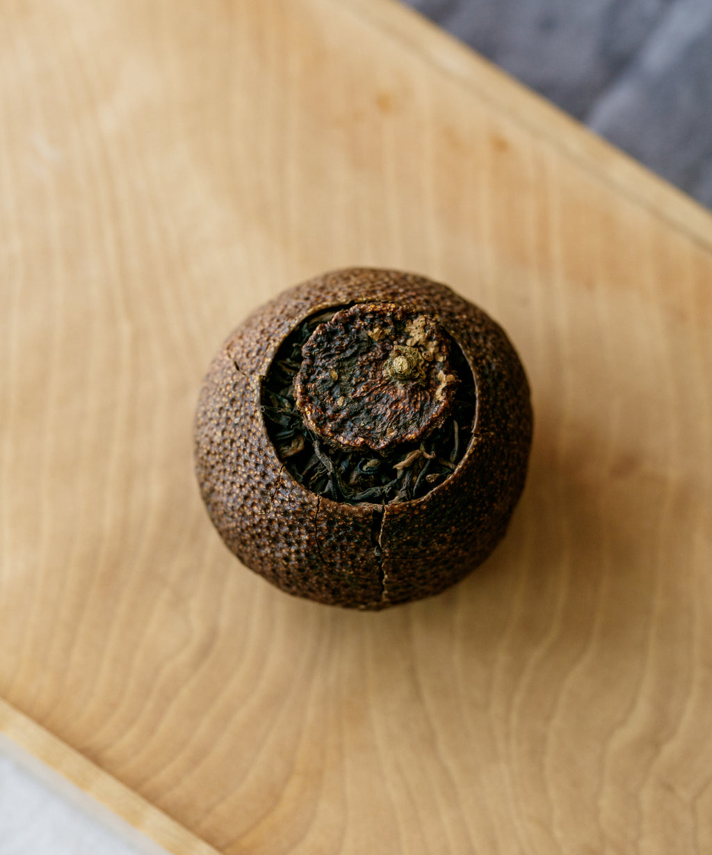 Imperial Pu'erh in Red Mandarin by Lange Tea Factory — shou pu'erh aged 13 years in mandarin rind, Menghai