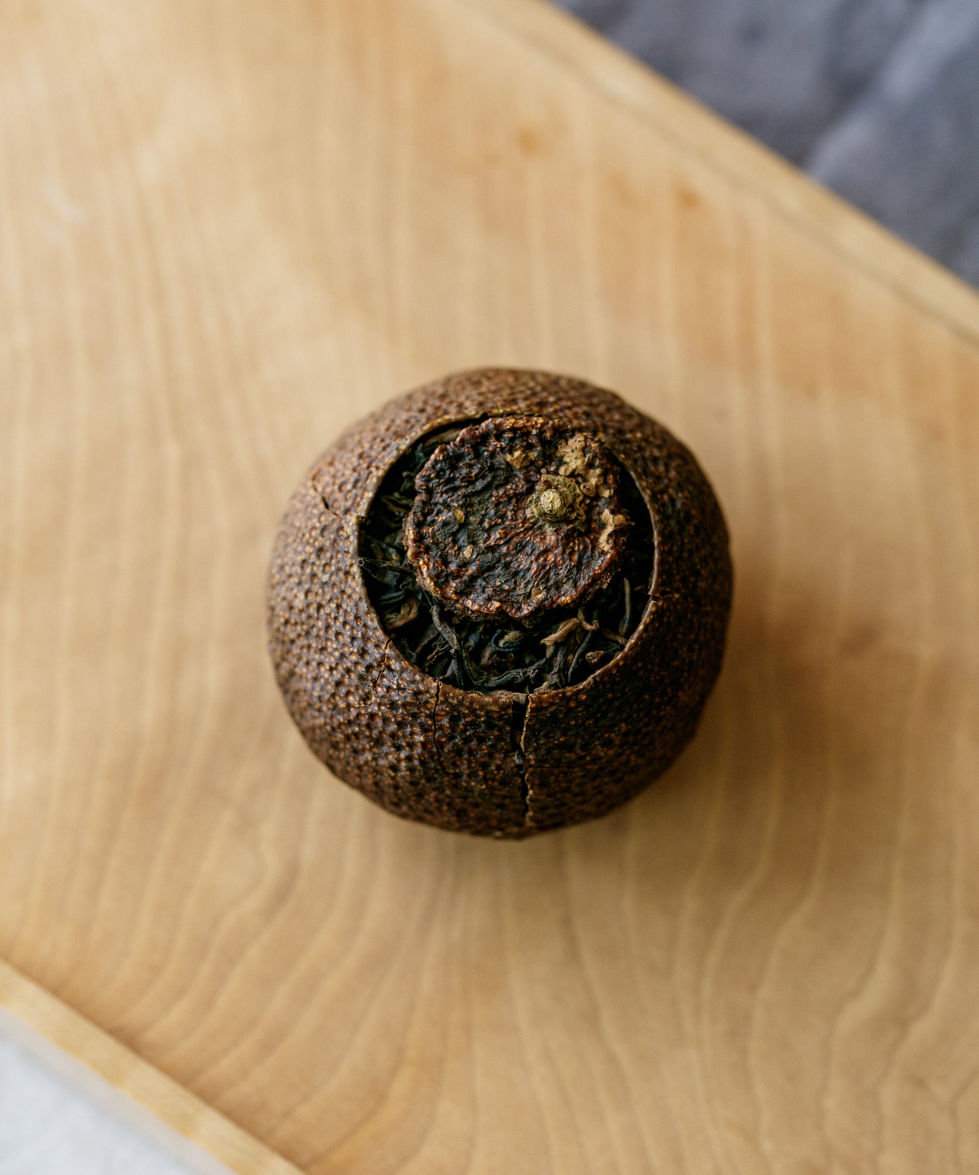 Imperial Pu'erh in Red Mandarin by Lange Tea Factory — shou pu'erh aged 13 years in mandarin rind, Menghai