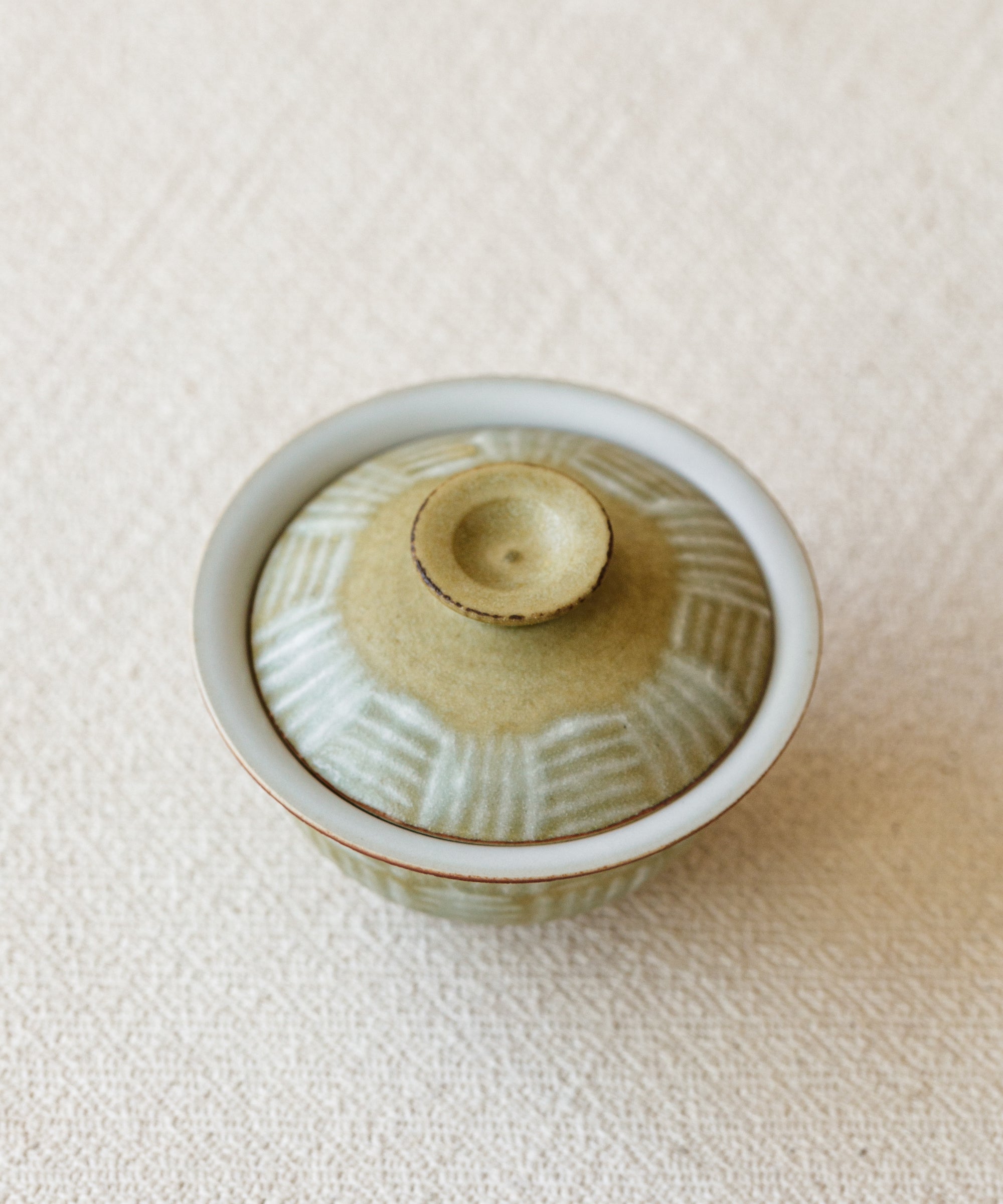 Mini Matte Yellow I Gaiwan in hand, matte yellow glaze showing scale, Wang Xinghua gongfu teaware